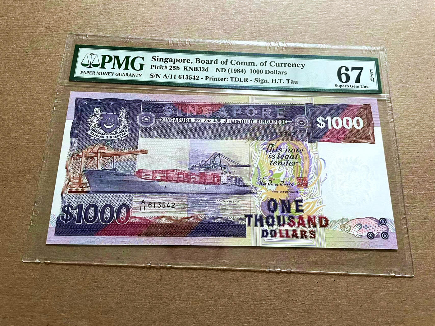 【Blue Auction】✨世界纸币精拍第500期盛典——白金之夜🔥🔥🔥 S-新加坡 1984年1000元高值 PMG67EPQ 高分 正面海王星石榴石号集装箱船是当时世界上最大的集装箱船之一 非常漂亮