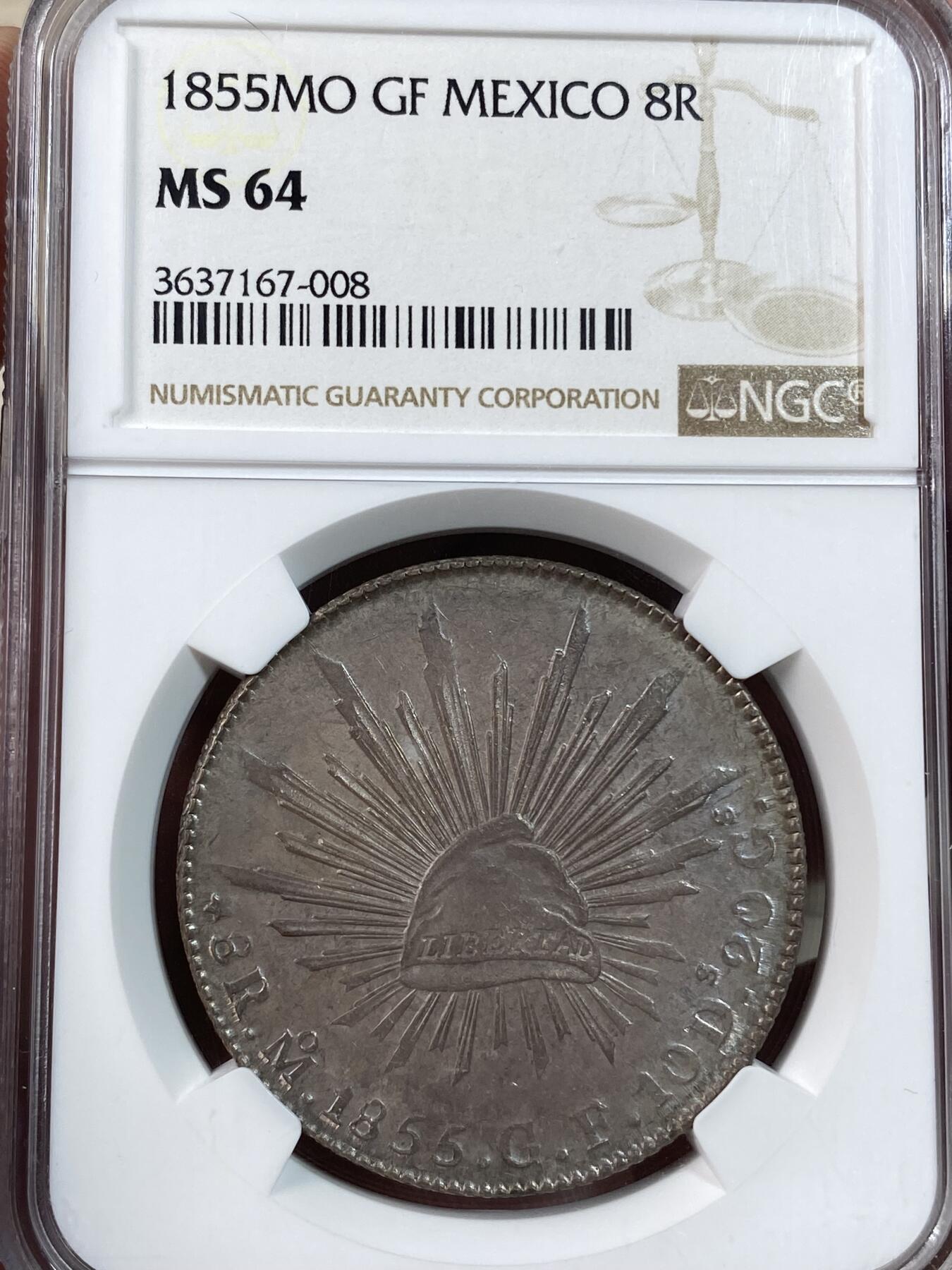 万国钱币拍卖第028期（花前月下●同享良章美币） NGC MS64 1855年墨西哥鹰洋8里亚尔 花边鹰洋 在华流通 MO-GF早期年份少见版别，双面老包浆，可爱粉紫彩。打制锐利，实物状态极佳。数据库亚军分，评级数稀少。