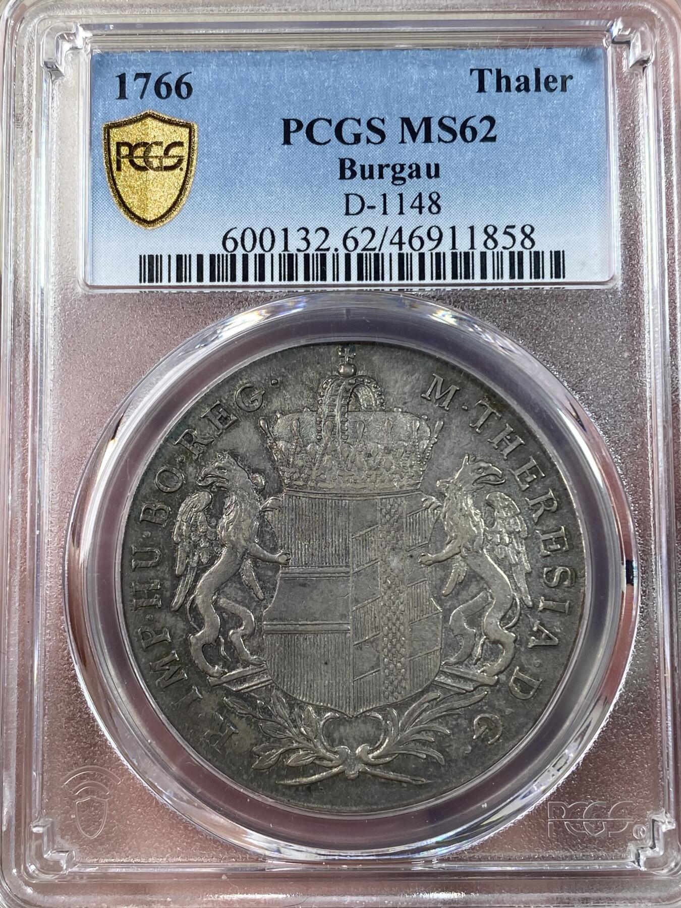 万国钱币拍卖第028期（花前月下●同享良章美币） PCGS MS62 1766年奥地利泰勒 布尔高厂 PCGS MS62  玛丽亚·特蕾莎治下的铸币，正面有其M. THERESIA的皇名，搭配经典的双狮鹫盾徽而非胸像。  两面深打，原始均匀包浆，带有蓝绿色调。
