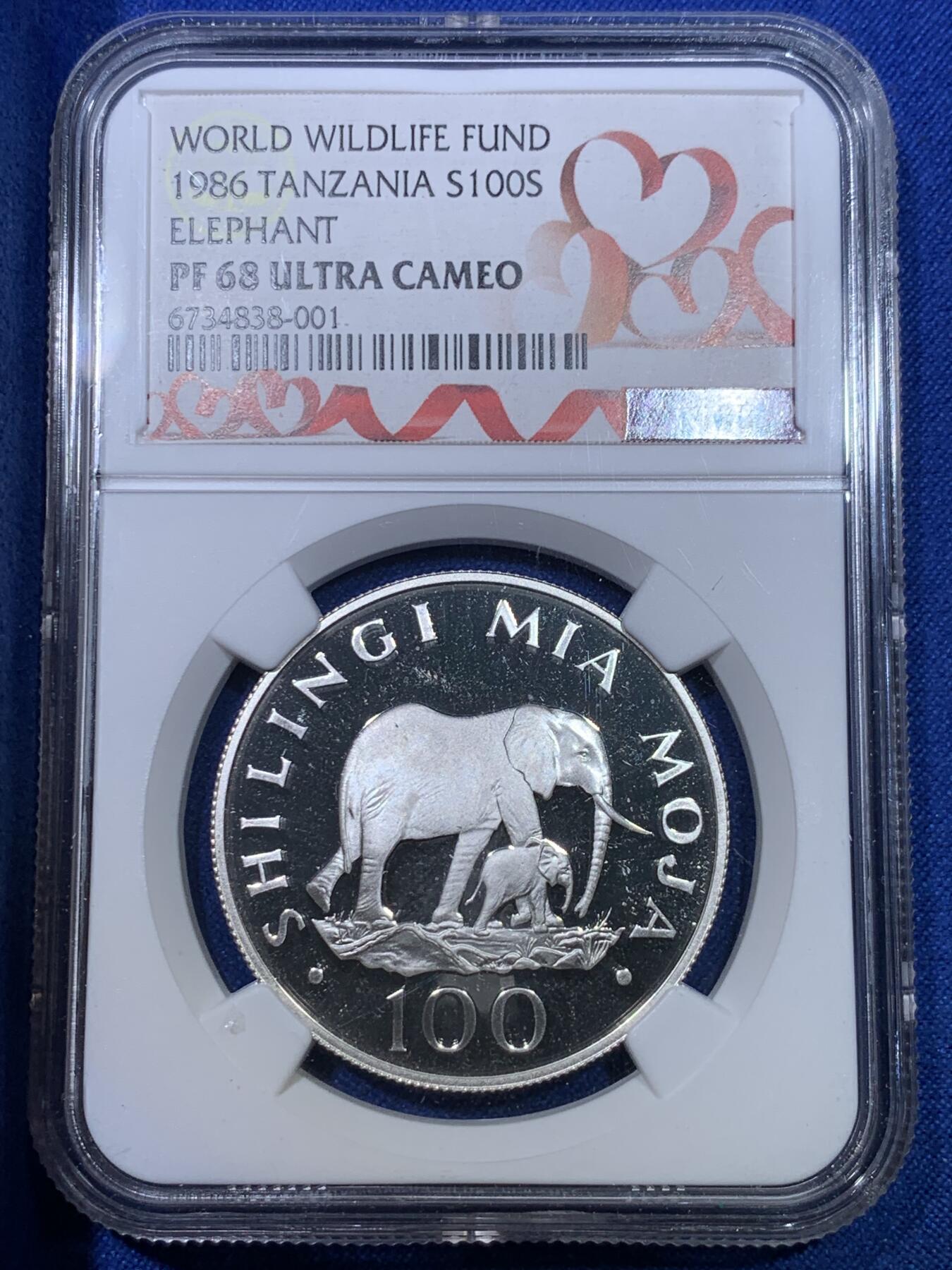 《竞宝斋》第284场- 周日，周一 2场连拍 （全场包邮） NGC PF68UC 坦桑尼亚1986年世界野生动物大象银币 红丝带定制标
