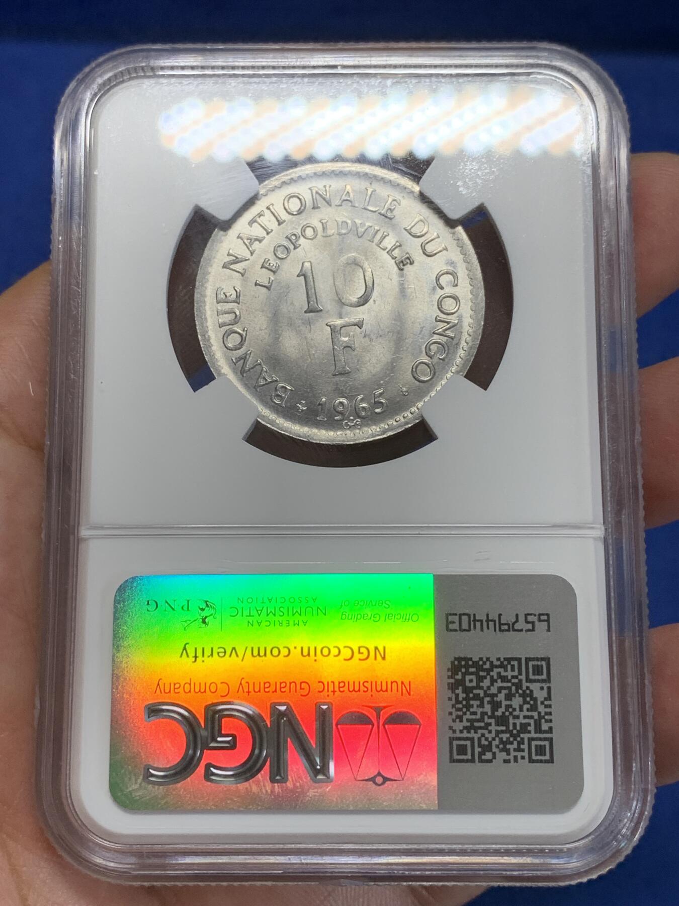 《竞宝斋》第284场- 周日，周一 2场连拍 （全场包邮） NGC MS63 刚果1965年10法郎铝币 大热品种 狮子图案非常受欢迎 铝币这个品相已经非常不容易了 两面都带转光 细节极好