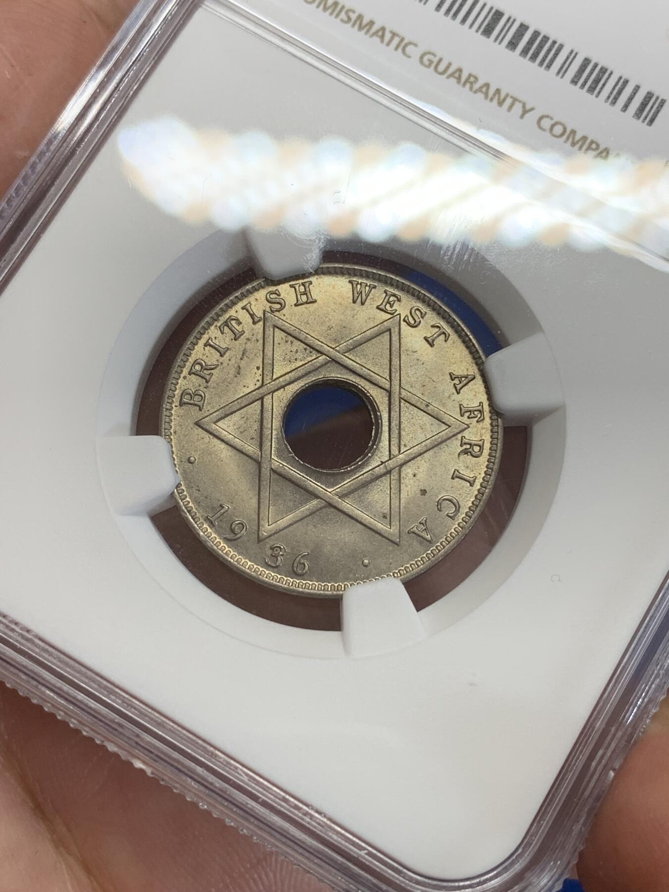 《竞宝斋》第284场- 周日，周一 2场连拍 （全场包邮） NGC MS64 英属西非1936半便士 六芒星图案大热 这枚63及以下很常见 64分就很难了 两面转光带淡淡的包浆 非常漂亮