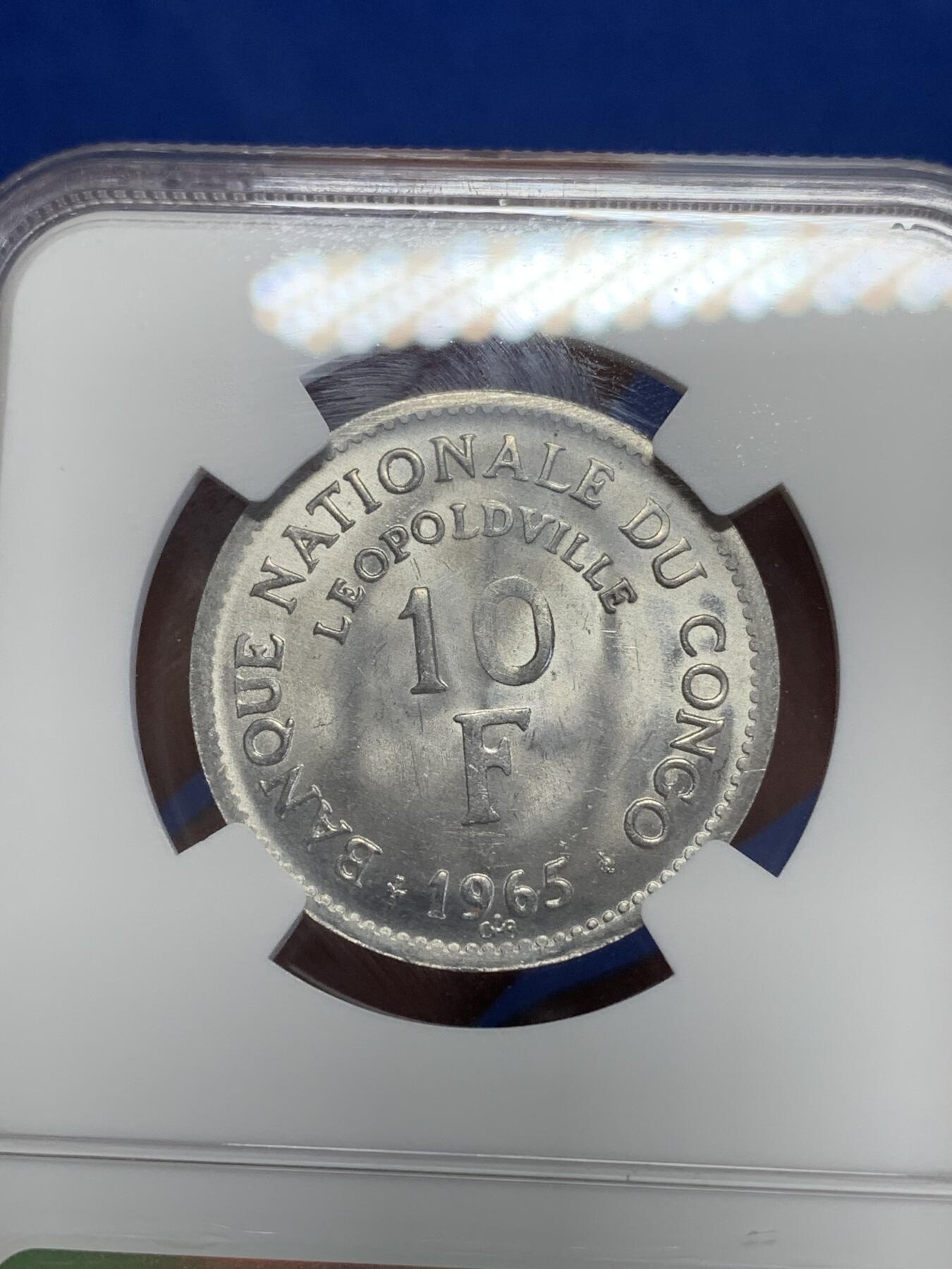 《竞宝斋》第284场- 周日，周一 2场连拍 （全场包邮） NGC MS63 刚果1965年10法郎铝币 大热品种 狮子图案非常受欢迎 铝币这个品相已经非常不容易了 两面都带转光 细节极好