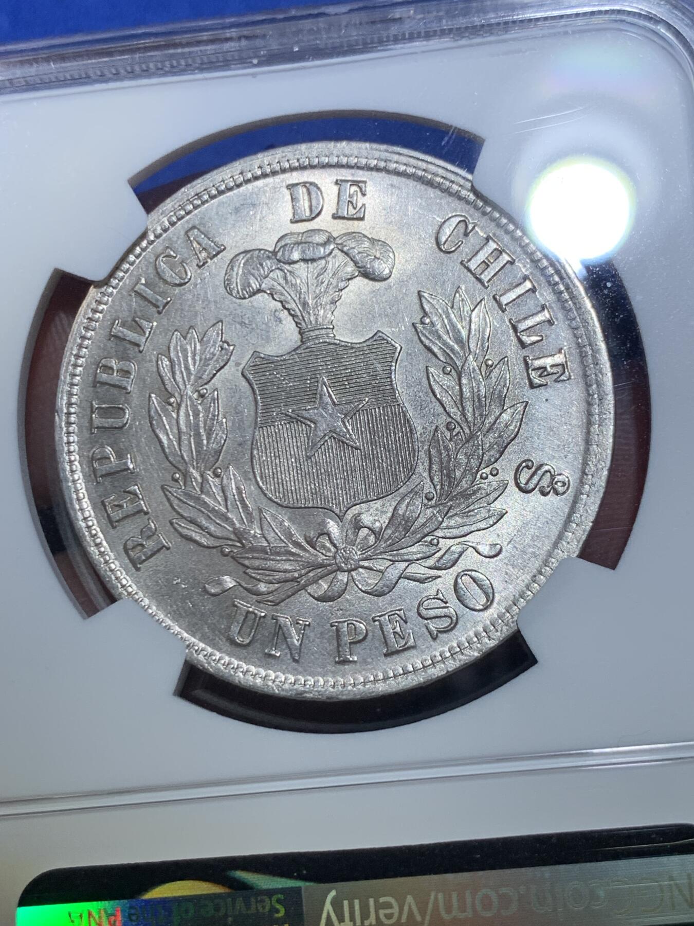 《竞宝斋》第284场- 周日，周一 2场连拍 （全场包邮） NGC MS63 智利 1884年 1比索 安第斯神鹰 大银币 光度很好 底板基本没瑕疵 同分中的战斗机 拉丁美洲潜力品种