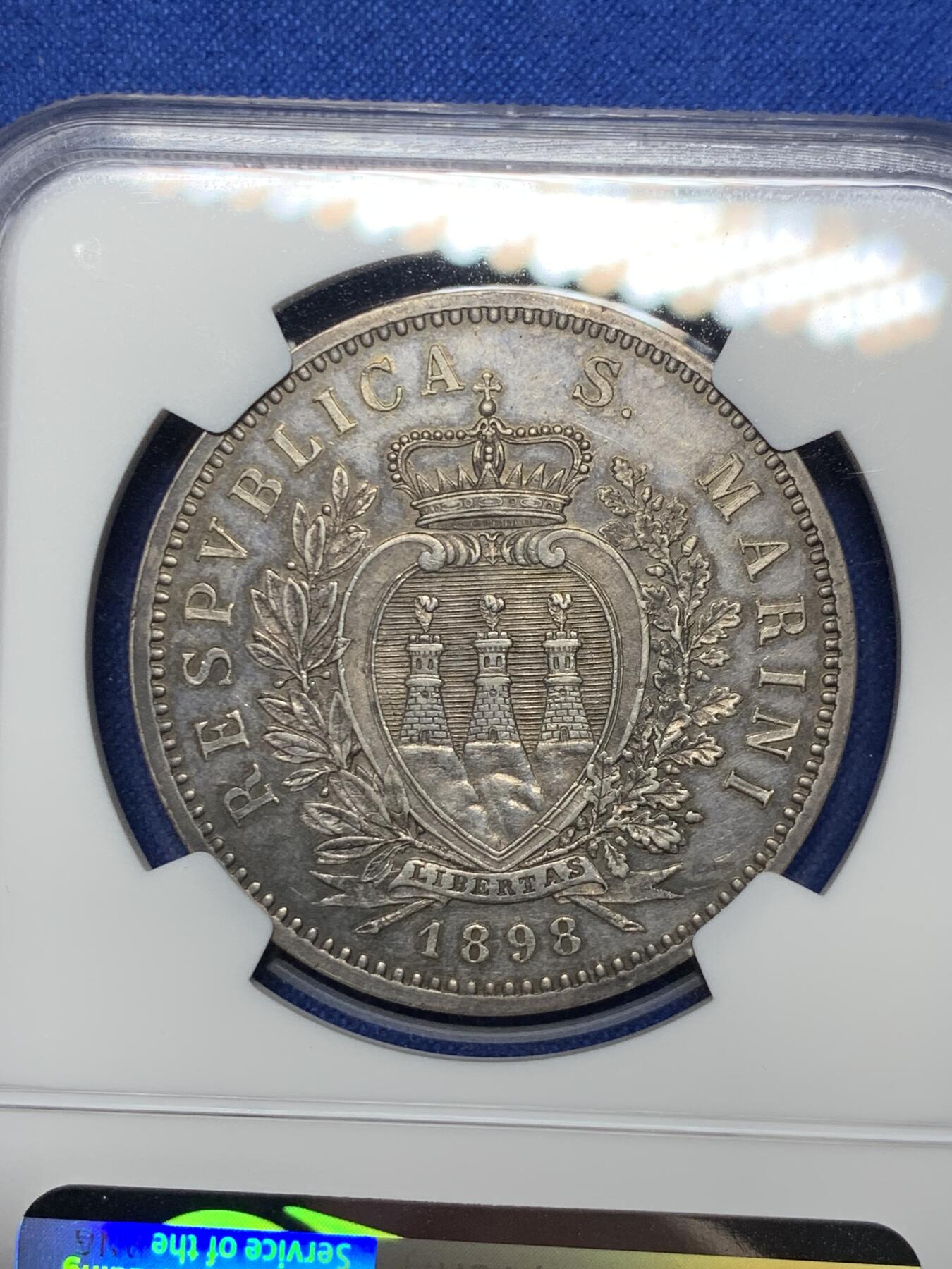 《竞宝斋》第284场- 周日，周一 2场连拍 （全场包邮） NGC-MS61 圣马力诺 1898 老版本圣马力诺5里拉神父。此币发行量18000，打的非常好 值得收藏把玩