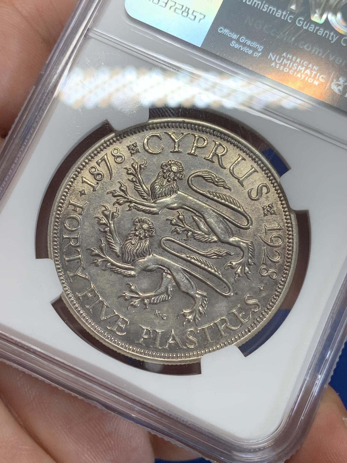 《竞宝斋》第284场- 周日，周一 2场连拍 （全场包邮） NGC UNC 英属塞浦路斯1928年乔治五世45皮银币 镜面底板 币面转光感强烈