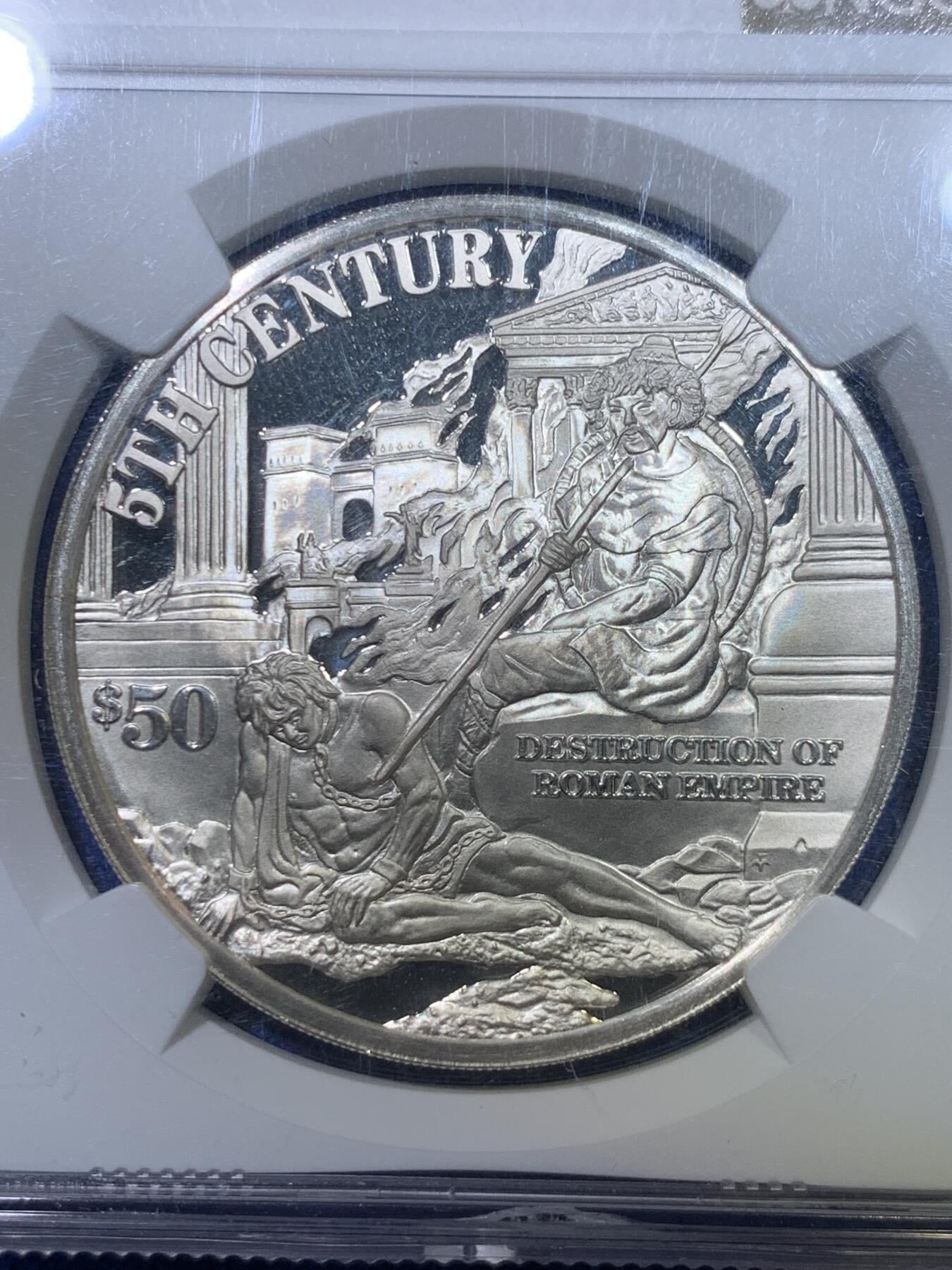 《竞宝斋》第284场- 周日，周一 2场连拍 （全场包邮） 唯一冠军分 NGC PF69UC 库克群岛1997年世纪系列之《五世纪罗马帝国的灭亡》50美元精制银币 凝霜镜面底板