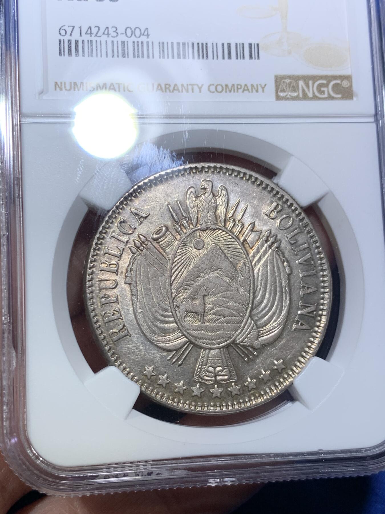 《竞宝斋》第285场- 周日，周一 2场连拍 （全场包邮） NGC AU55 玻利维亚1864年1玻大银币 该版首发年份，不是常见后期年份，好品很少，快速上涨的南美币品种，低评