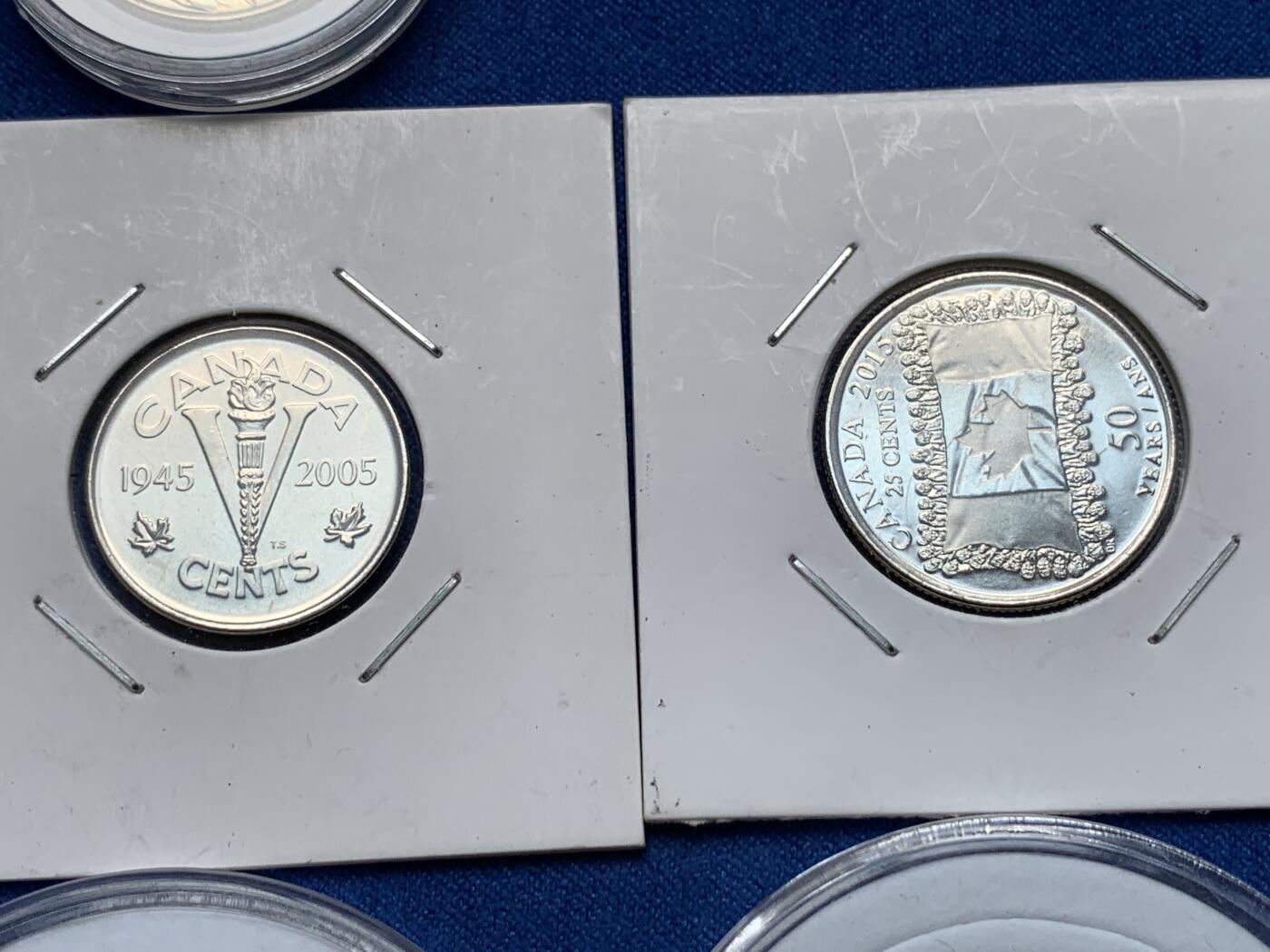 《竞宝斋》第285场- 周日，周一 2场连拍 （全场包邮） 7枚一组 加拿大25分纪念币6枚+2加元纪念币1枚