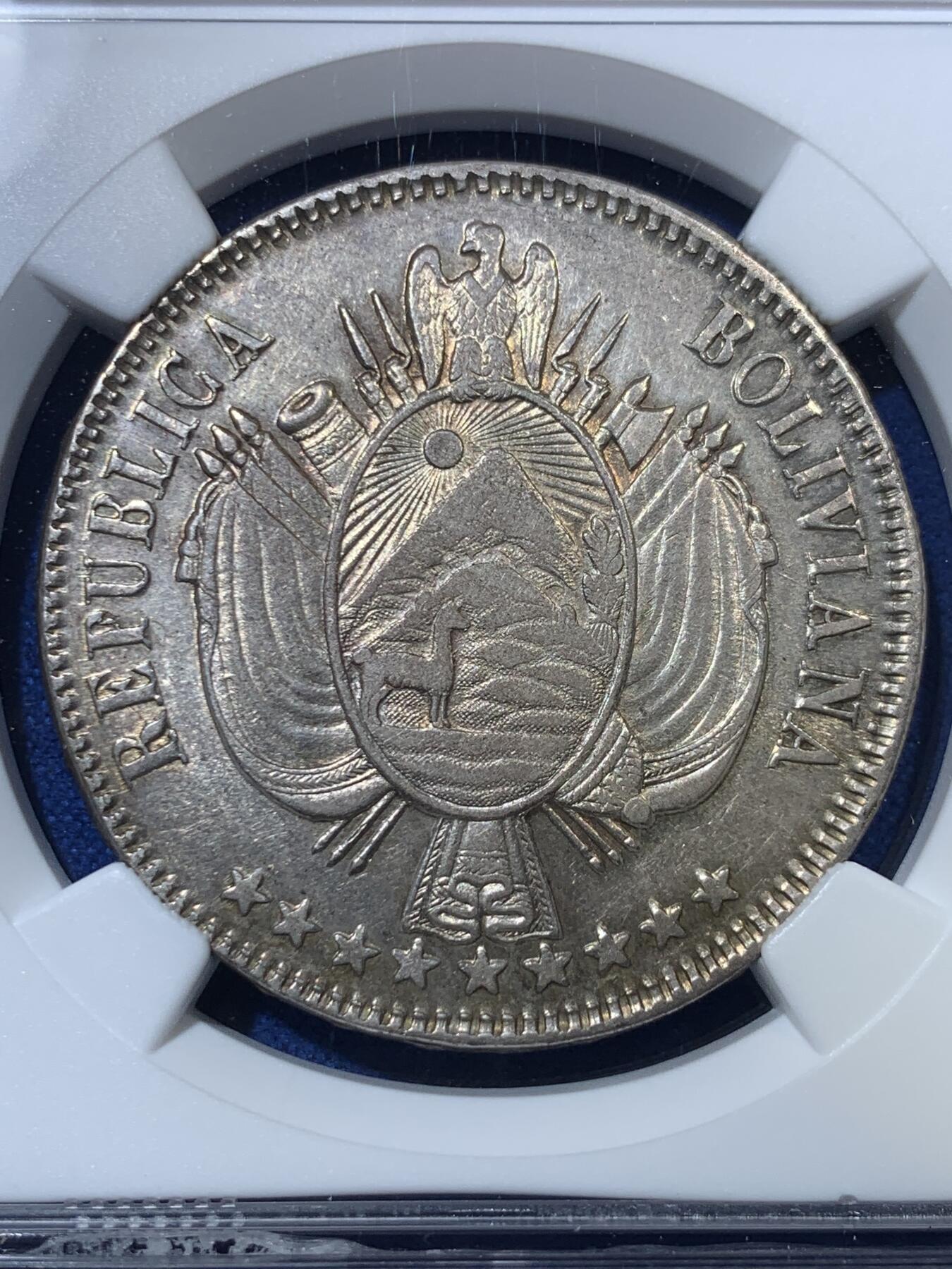 《竞宝斋》第285场- 周日，周一 2场连拍 （全场包邮） NGC AU55 玻利维亚1864年1玻大银币 该版首发年份，不是常见后期年份，好品很少，快速上涨的南美币品种，低评