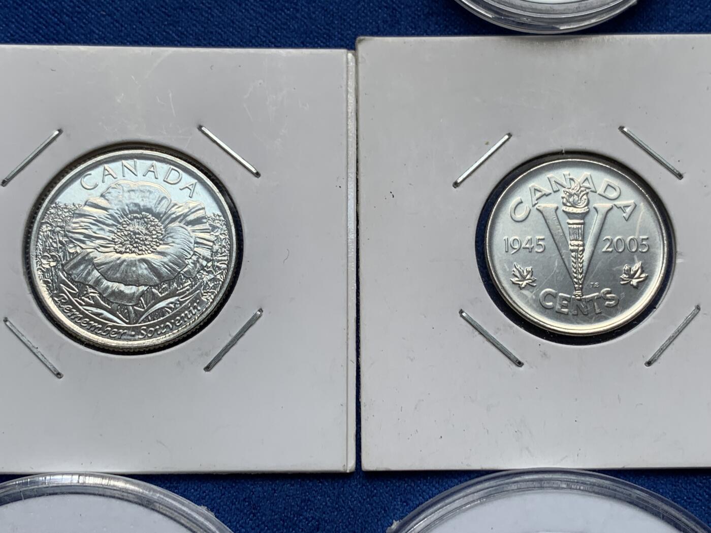 《竞宝斋》第285场- 周日，周一 2场连拍 （全场包邮） 7枚一组 加拿大25分纪念币6枚+2加元纪念币1枚