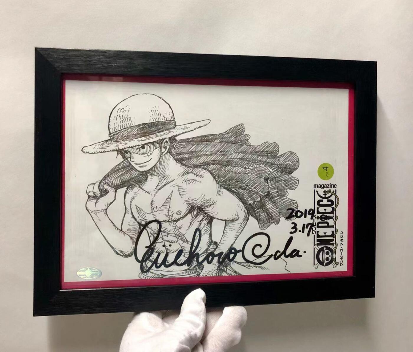 零元拍：日本著名漫画家《海贼王》尾田荣一郎 亲笔签名《ONE PIECE》杂志扉页，已做裱框。