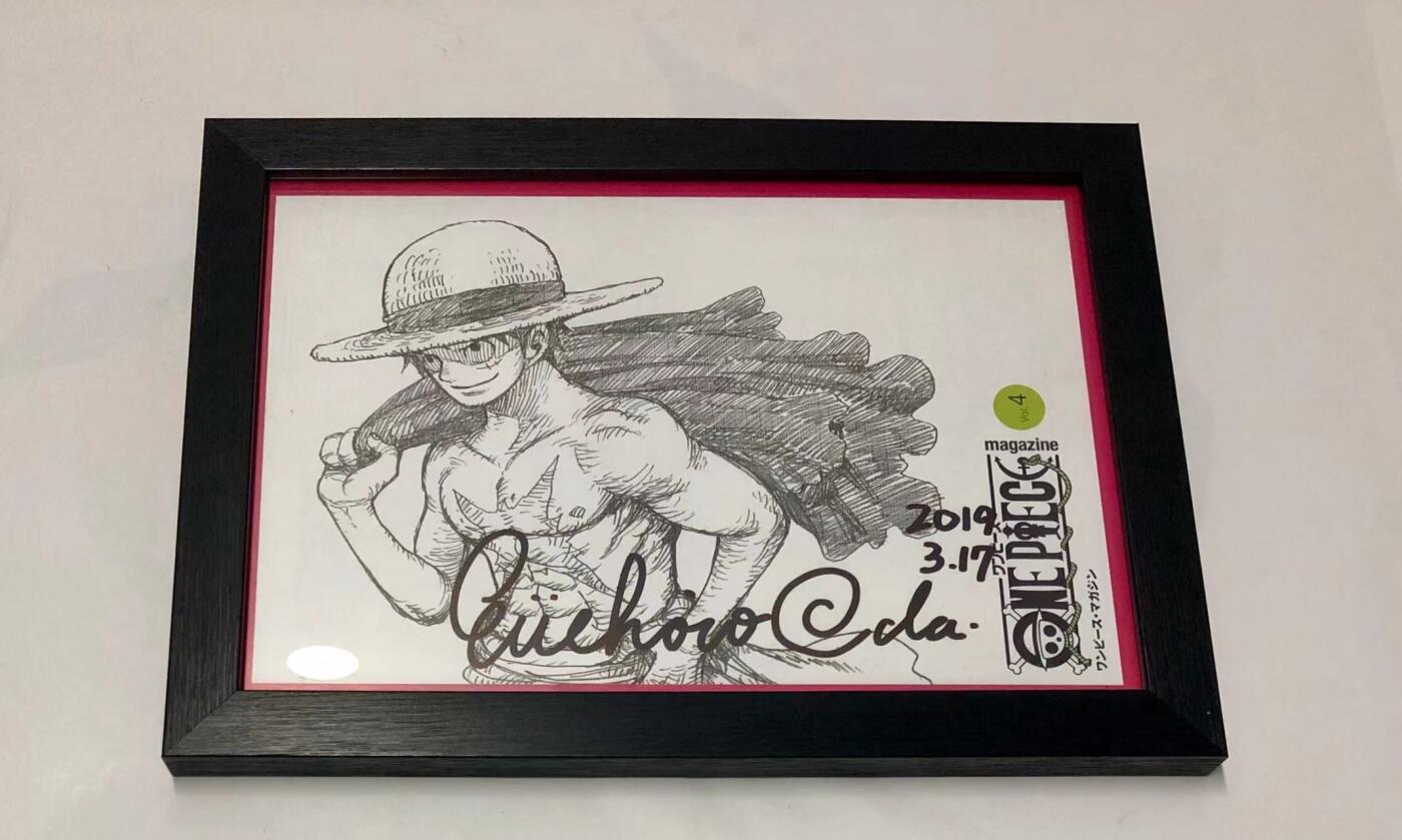 零元拍：日本著名漫画家《海贼王》尾田荣一郎 亲笔签名《ONE PIECE》杂志扉页，已做裱框。