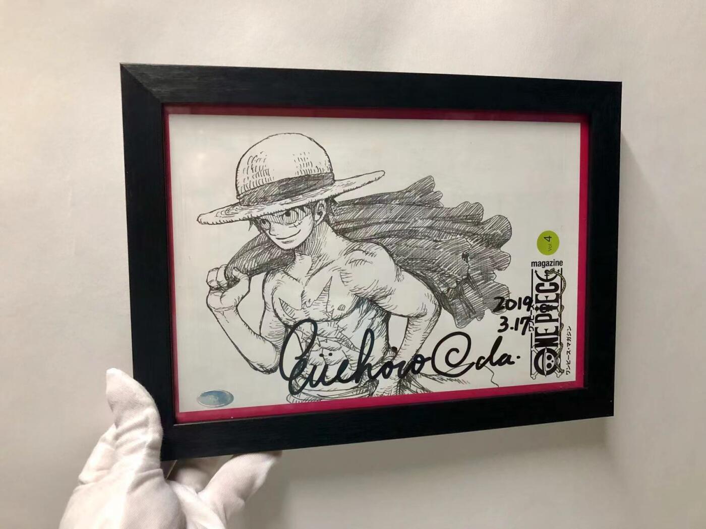 零元拍：日本著名漫画家《海贼王》尾田荣一郎 亲笔签名《ONE PIECE》杂志扉页，已做裱框。