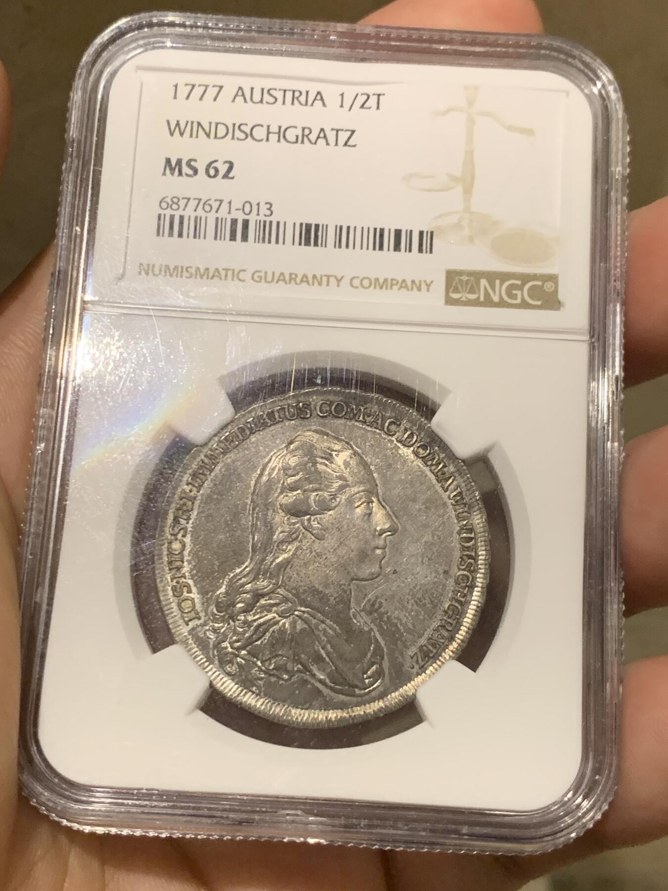 《竞宝斋》第287场-周六， 周日，周一 3场连拍 （全场包邮） NGC MS62 神圣罗马帝国1777温迪施格雷茨家族1/2泰勒 很稀少的奥地利小邦国 用于炫耀铸币权，并不用于流通。该邦最后的伯爵，最大面值就是1/2，未发行1泰勒主币。22年61分的拍了13500人民币。