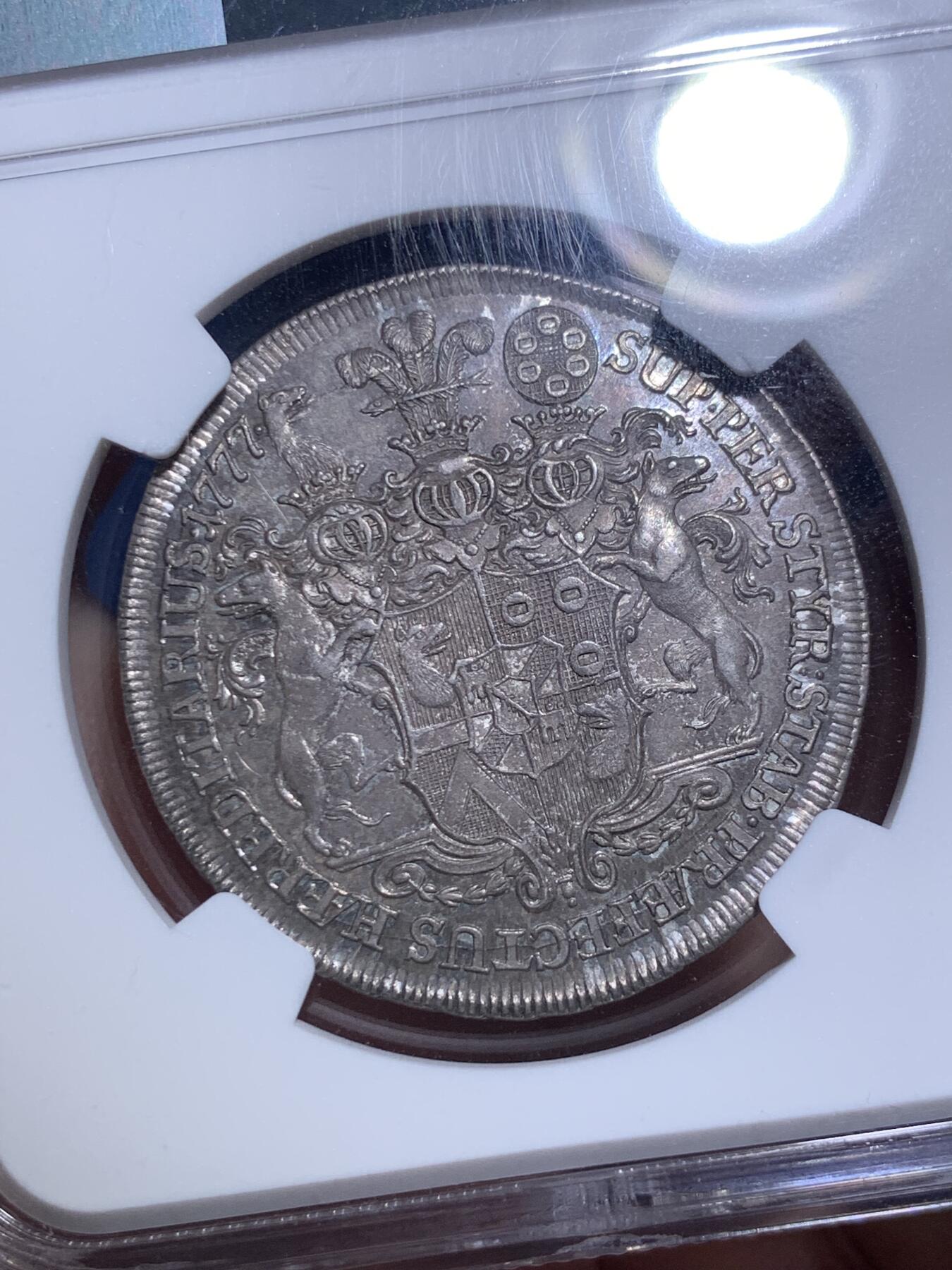 《竞宝斋》第287场-周六， 周日，周一 3场连拍 （全场包邮） NGC MS62 神圣罗马帝国1777温迪施格雷茨家族1/2泰勒 很稀少的奥地利小邦国 用于炫耀铸币权，并不用于流通。该邦最后的伯爵，最大面值就是1/2，未发行1泰勒主币。22年61分的拍了13500人民币。