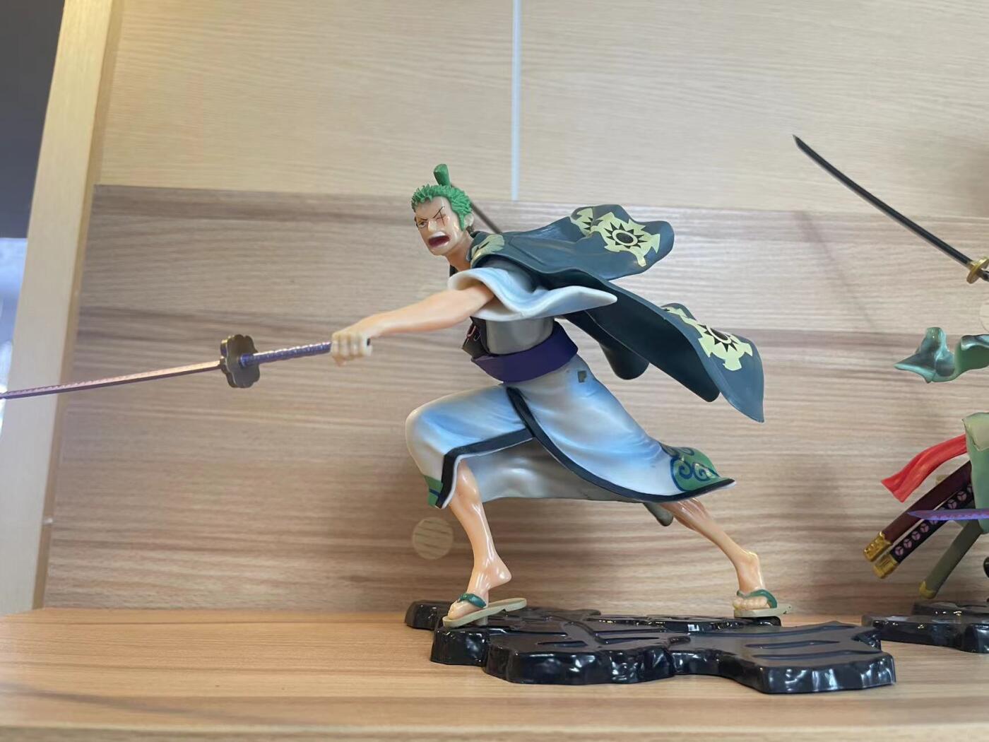 零元拍：祖国版海贼王索隆三千天下，带替换头和特效件。拍一赠一，送和之国版三千天下（一把刀断配件在可自己修复），随便把玩好伴侣～