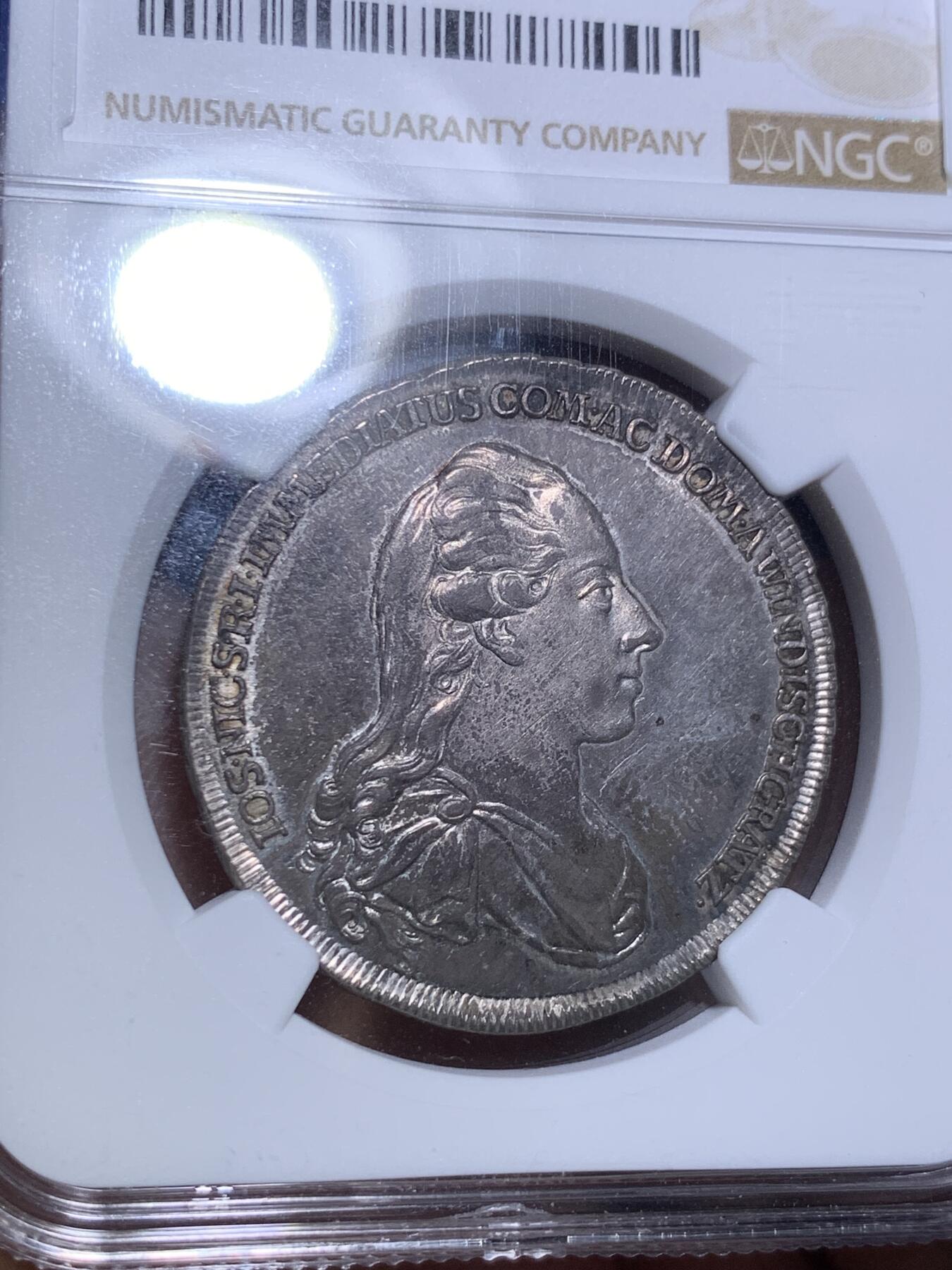 《竞宝斋》第287场-周六， 周日，周一 3场连拍 （全场包邮） NGC MS62 神圣罗马帝国1777温迪施格雷茨家族1/2泰勒 很稀少的奥地利小邦国 用于炫耀铸币权，并不用于流通。该邦最后的伯爵，最大面值就是1/2，未发行1泰勒主币。22年61分的拍了13500人民币。