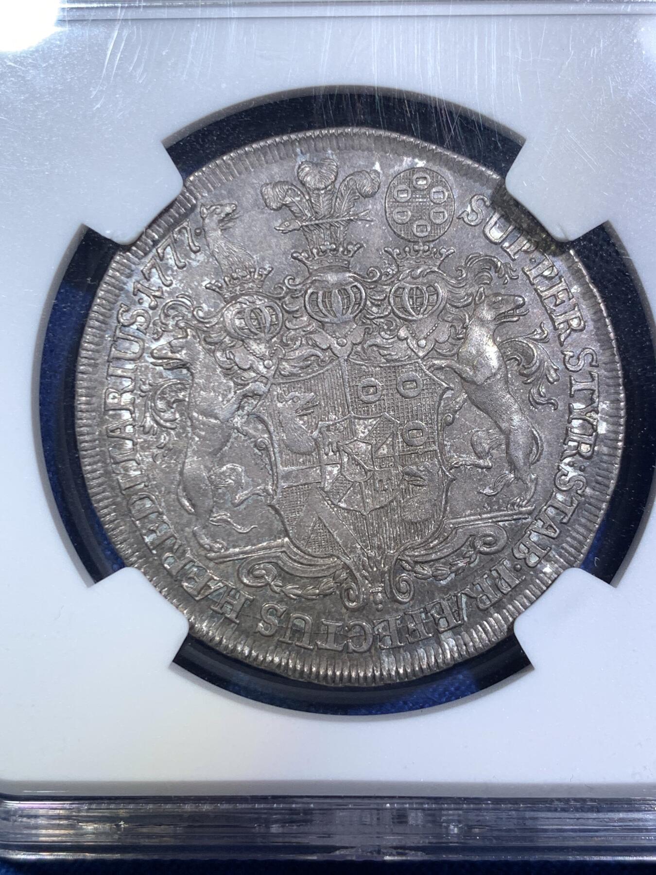 《竞宝斋》第287场-周六， 周日，周一 3场连拍 （全场包邮） NGC MS62 神圣罗马帝国1777温迪施格雷茨家族1/2泰勒 很稀少的奥地利小邦国 用于炫耀铸币权，并不用于流通。该邦最后的伯爵，最大面值就是1/2，未发行1泰勒主币。22年61分的拍了13500人民币。