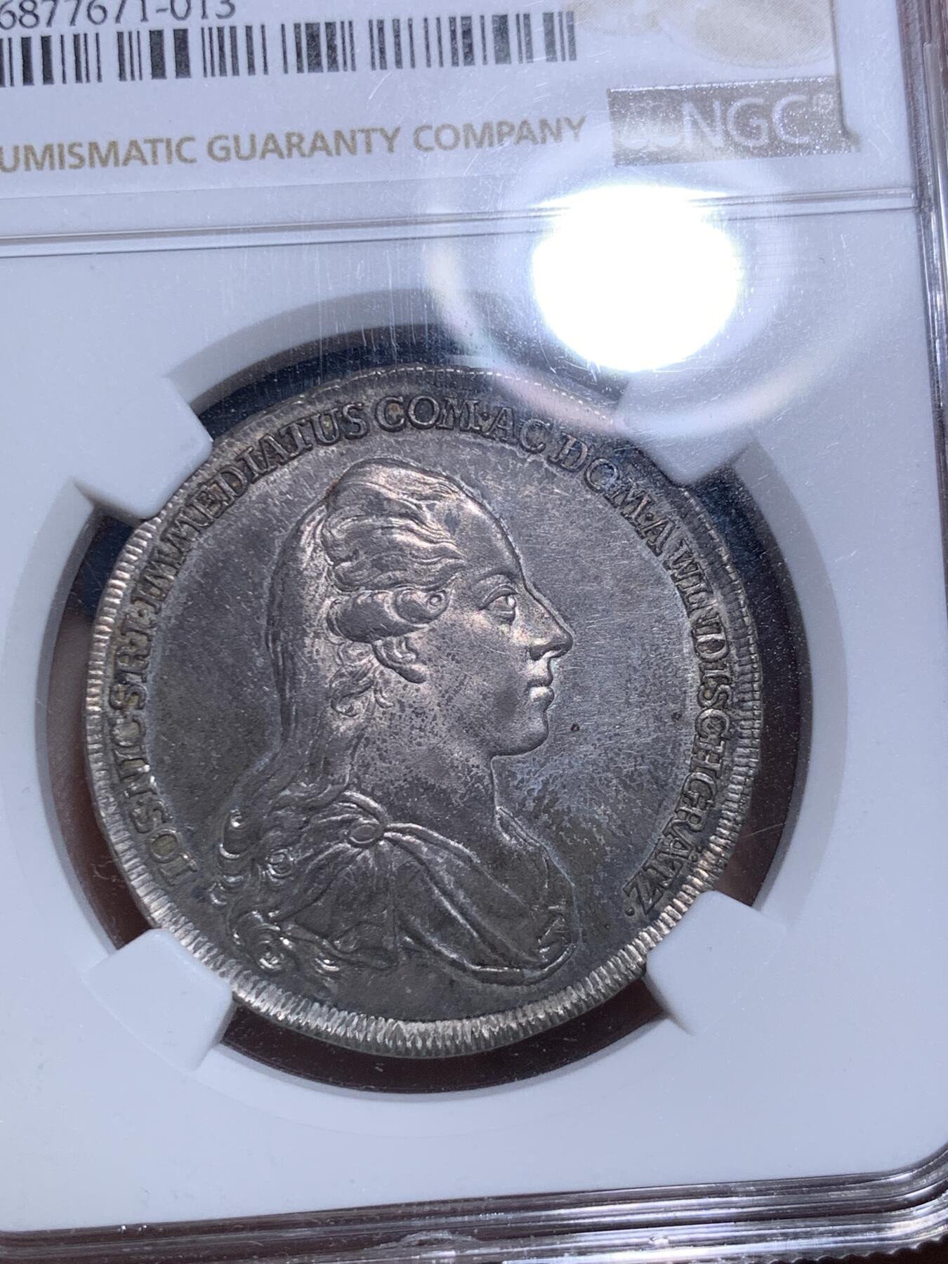 《竞宝斋》第287场-周六， 周日，周一 3场连拍 （全场包邮） NGC MS62 神圣罗马帝国1777温迪施格雷茨家族1/2泰勒 很稀少的奥地利小邦国 用于炫耀铸币权，并不用于流通。该邦最后的伯爵，最大面值就是1/2，未发行1泰勒主币。22年61分的拍了13500人民币。