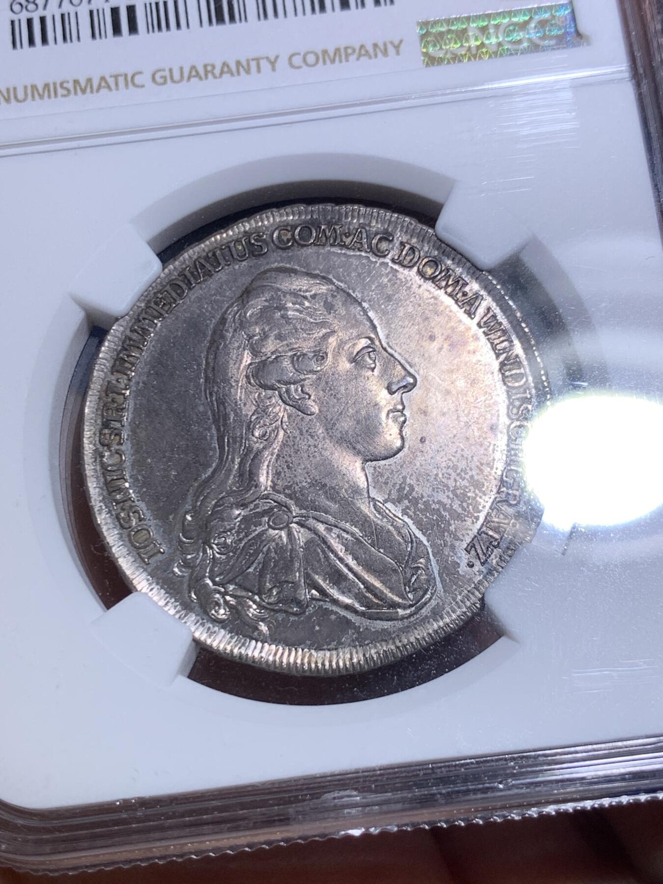 《竞宝斋》第287场-周六， 周日，周一 3场连拍 （全场包邮） NGC MS62 神圣罗马帝国1777温迪施格雷茨家族1/2泰勒 很稀少的奥地利小邦国 用于炫耀铸币权，并不用于流通。该邦最后的伯爵，最大面值就是1/2，未发行1泰勒主币。22年61分的拍了13500人民币。