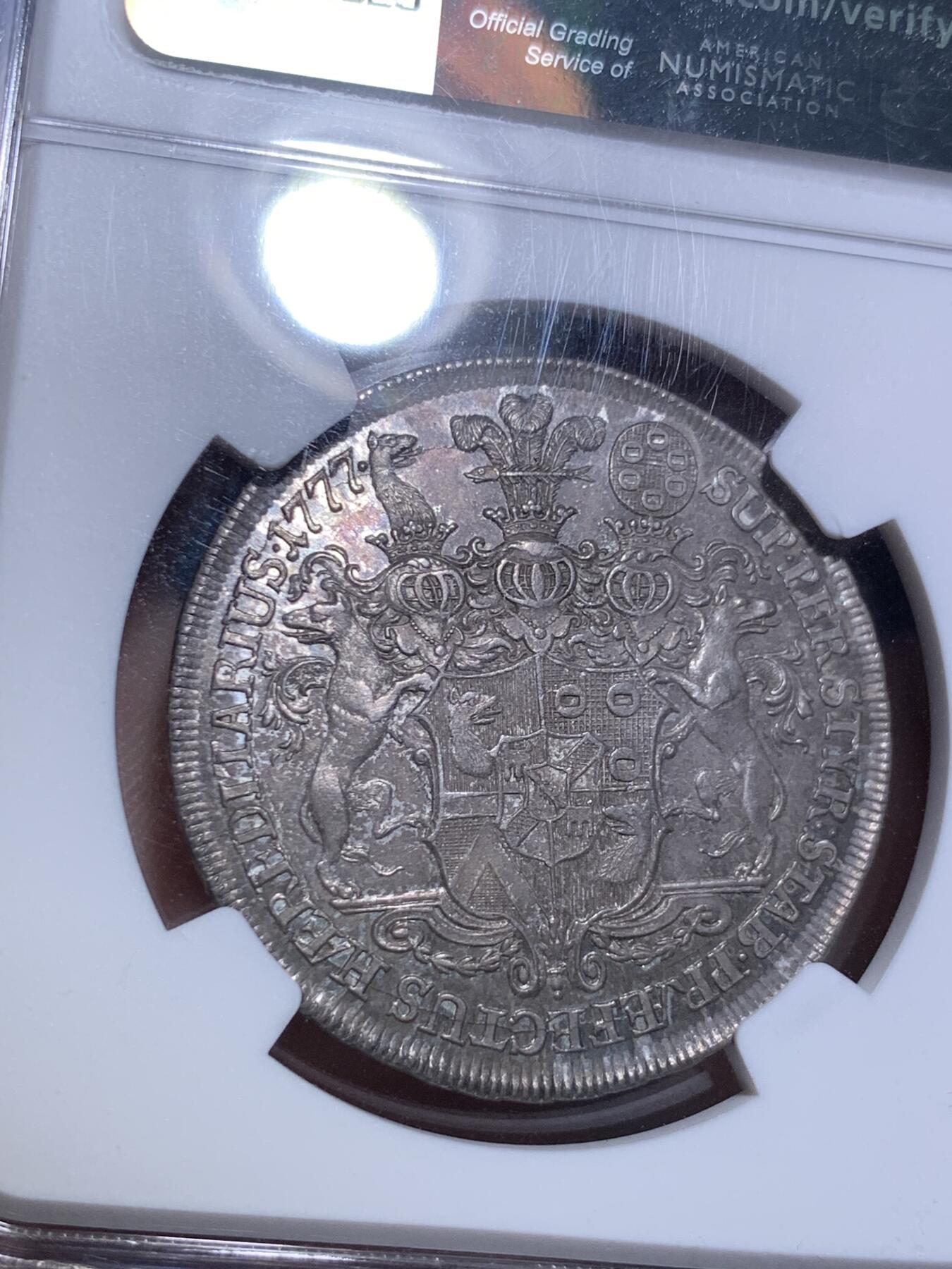 《竞宝斋》第287场-周六， 周日，周一 3场连拍 （全场包邮） NGC MS62 神圣罗马帝国1777温迪施格雷茨家族1/2泰勒 很稀少的奥地利小邦国 用于炫耀铸币权，并不用于流通。该邦最后的伯爵，最大面值就是1/2，未发行1泰勒主币。22年61分的拍了13500人民币。