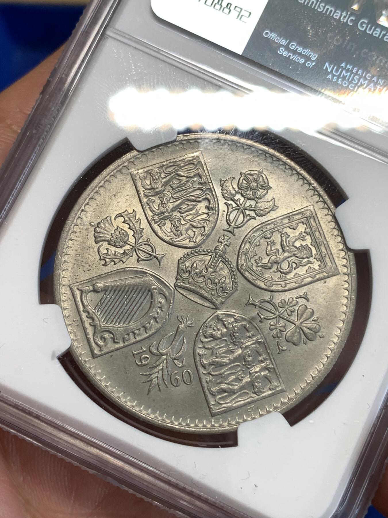 《竞宝斋》第287场-周六， 周日，周一 3场连拍 （全场包邮） NGC UNC 英国1960年纽约博览会伊丽莎白女王纪念克朗币 严评没给分，比登基克朗少见