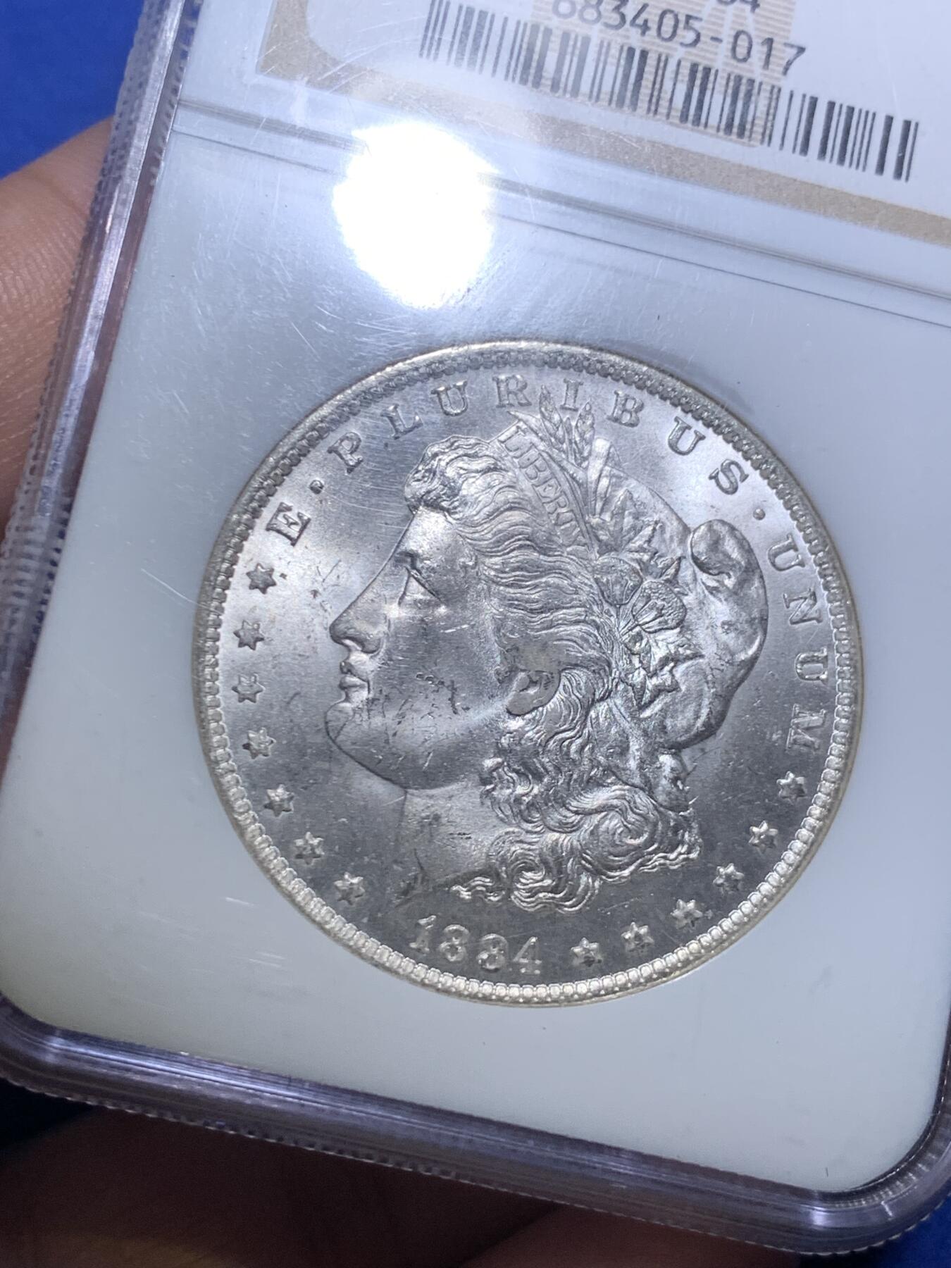 《竞宝斋》第288场-周六， 周日，周一 3场连拍 （全场包邮） NGC MS64 1884年美国摩根银币O版  N经典小白盒老盒严评无官网图。