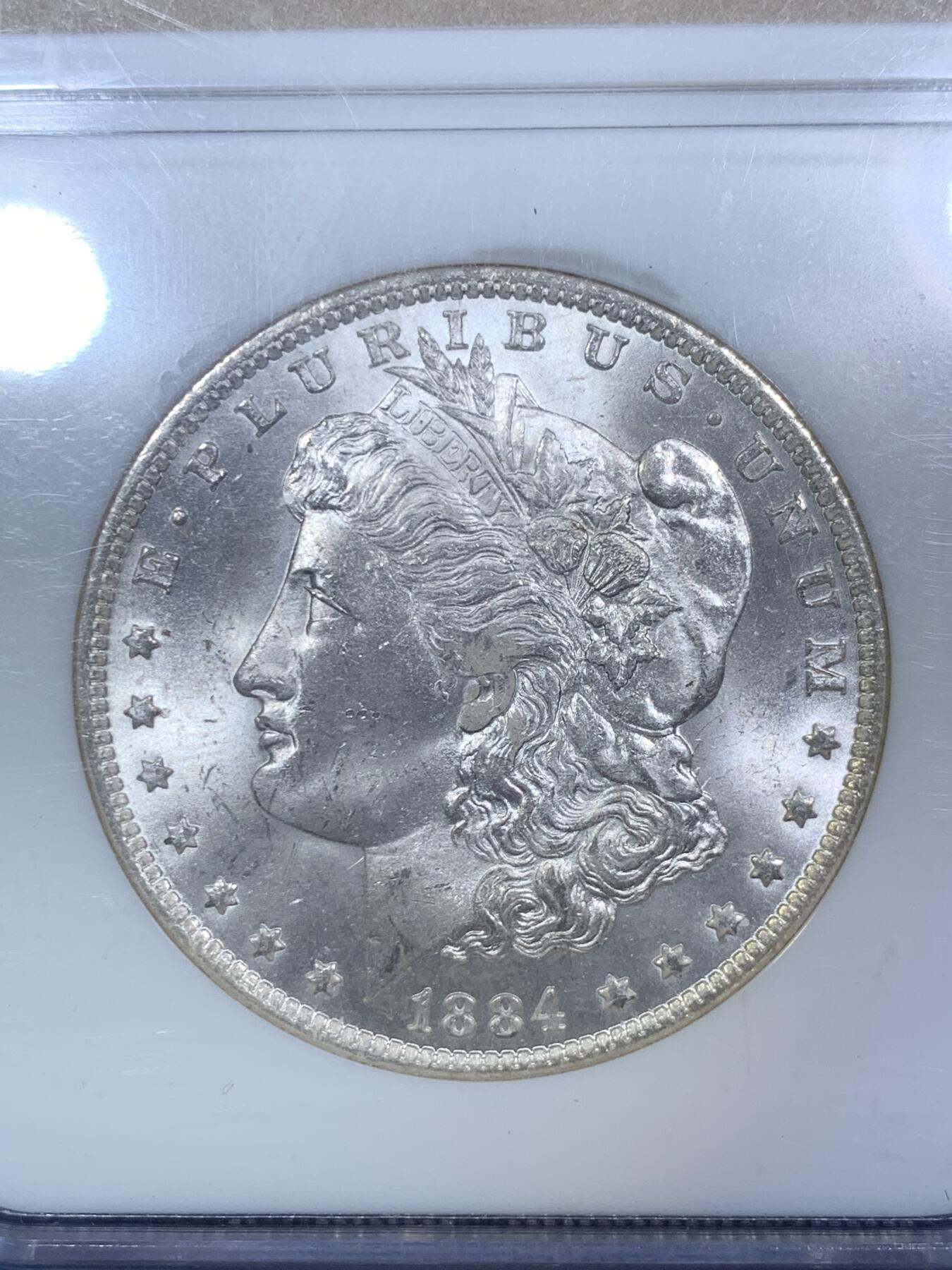 《竞宝斋》第288场-周六， 周日，周一 3场连拍 （全场包邮） NGC MS64 1884年美国摩根银币O版  N经典小白盒老盒严评无官网图。