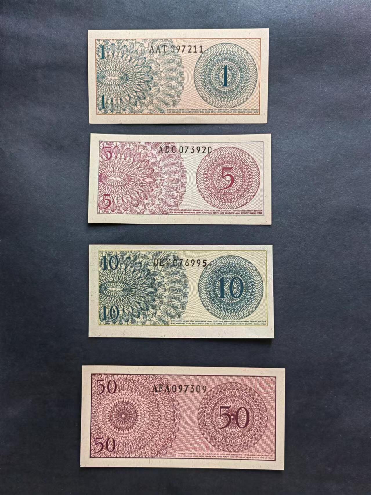 外中纸币专场240719第五场 印度尼西亚1964年四张，UNC，10盾有轻软折
