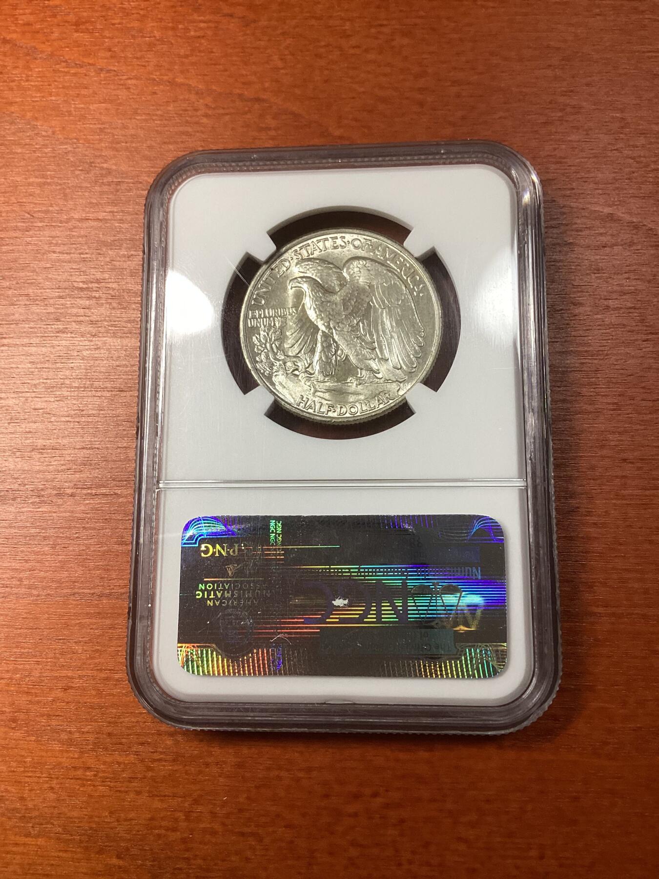 长老汇龙年精选第八场拍卖 1947美国早期行走女神半圆银币，NGC MS64，老盒低评，官网90美金
