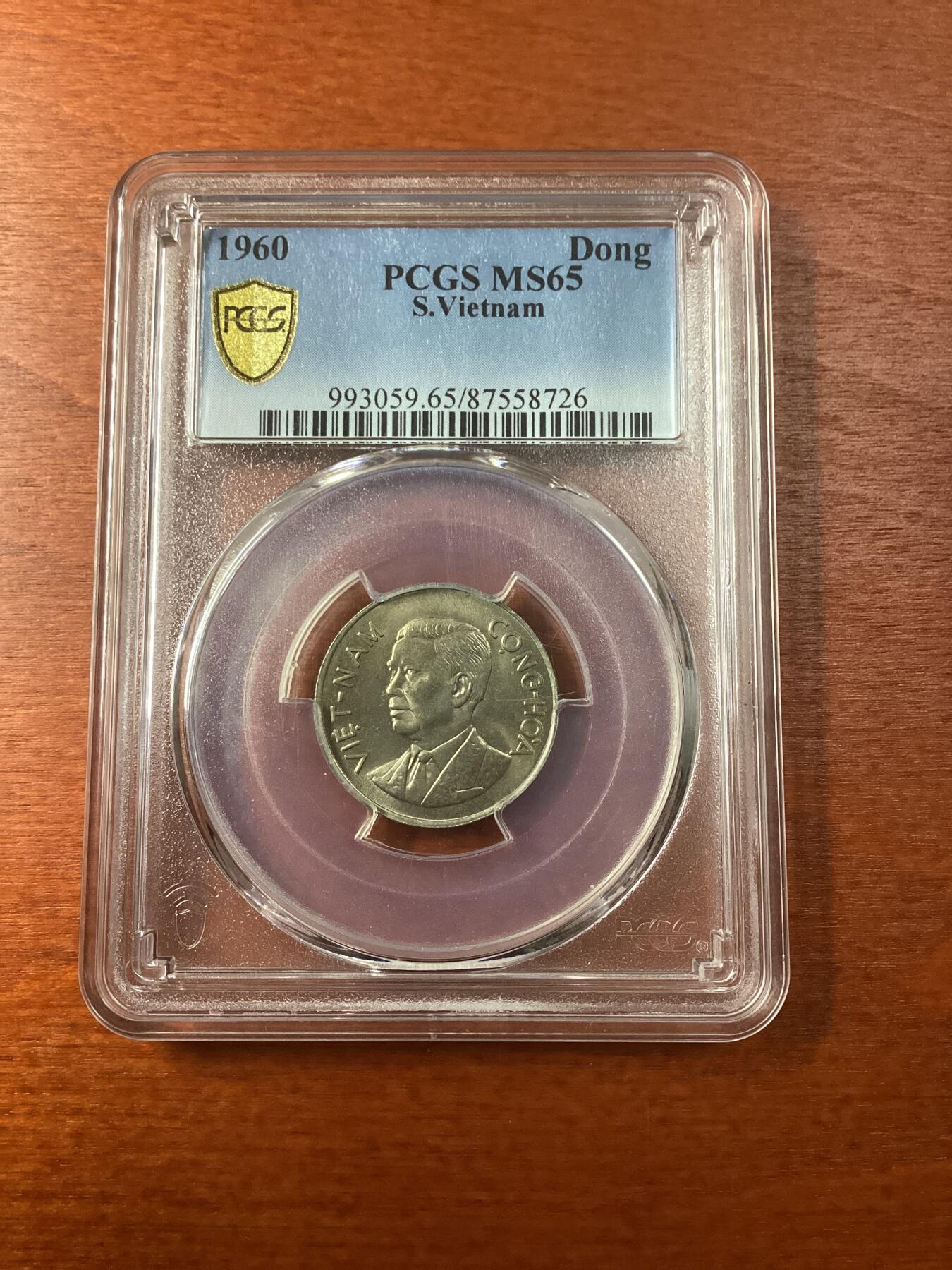 长老汇龙年精选第九场拍卖 1960 南越吴庭艳1盾铜镍币，PCGS MS65分，亚军分，更高分仅有3枚，黄灿灿
