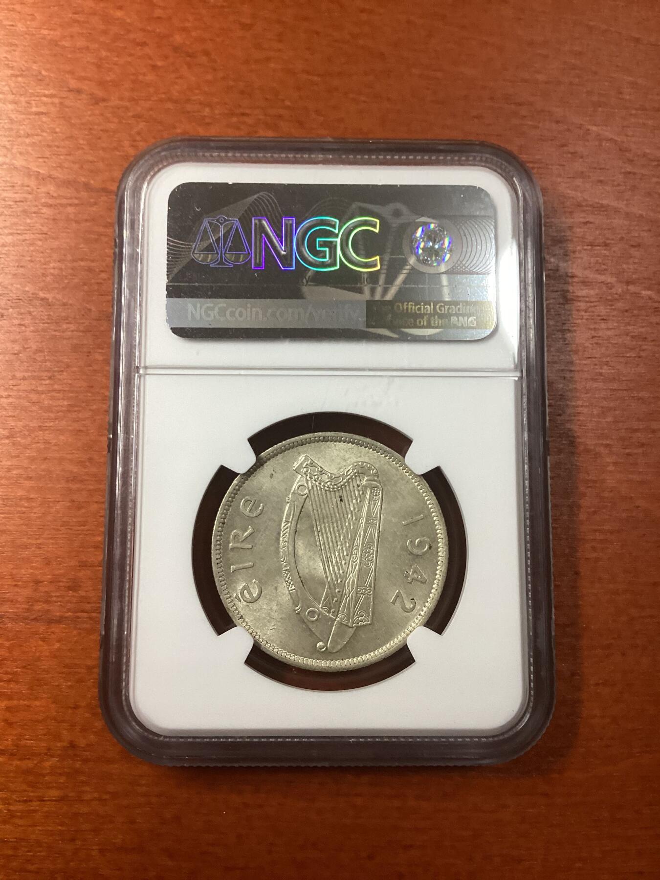 长老汇龙年精选第九场拍卖 1942 爱尔兰马1/2克朗银币，NGC AU58