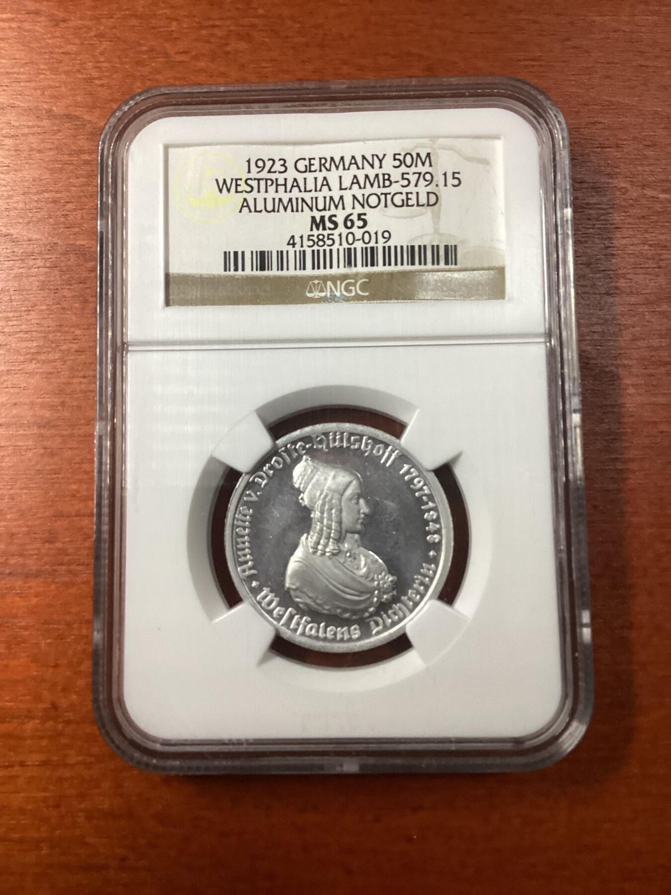 长老汇马年精选第九场拍卖  1923德国威斯特法兰德紧马币女诗人50马克，NGC MS65，亚军分，更高4枚，老盒