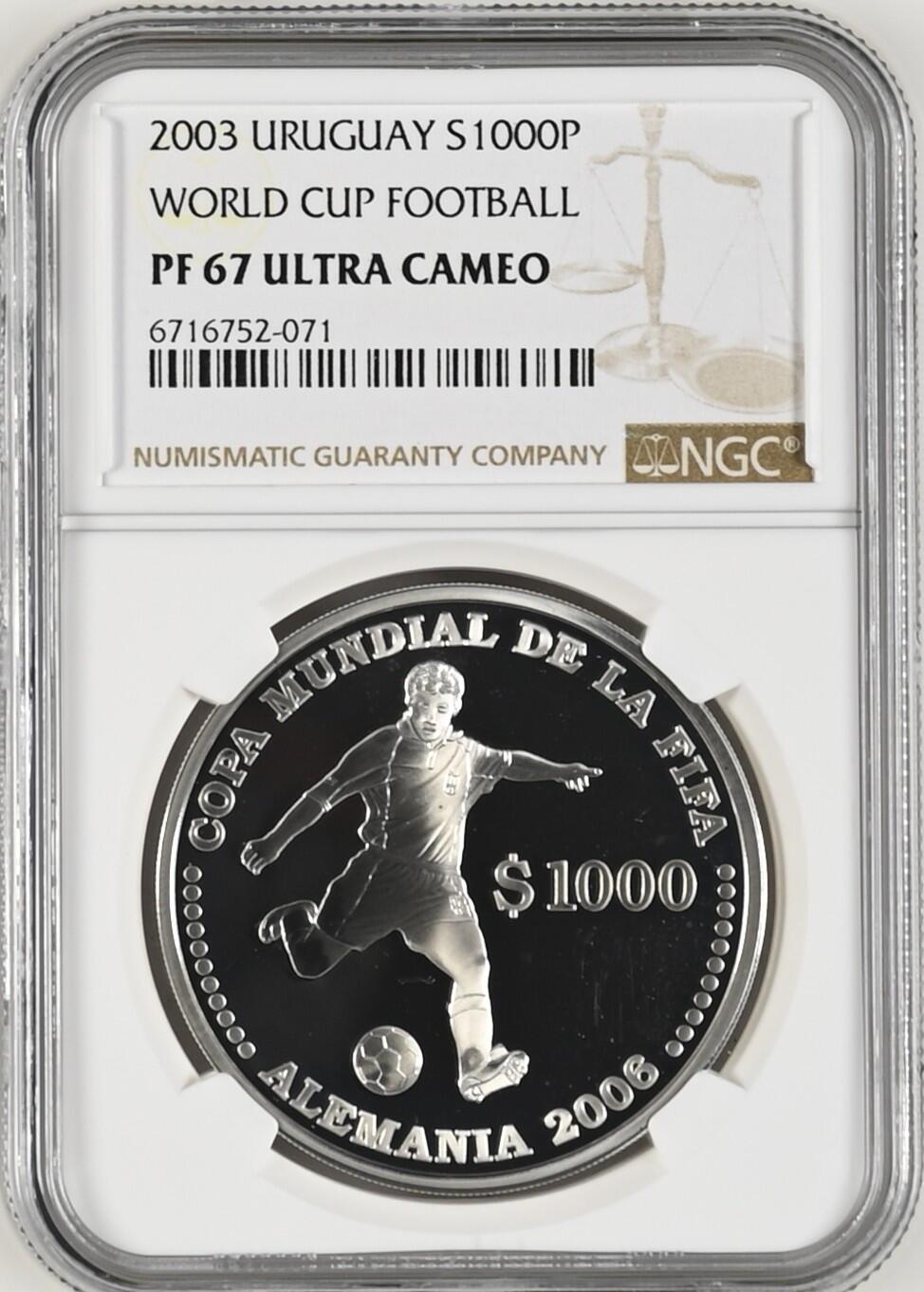 长老汇龙年精选第九场拍卖 2003 乌拉圭2006德国世界杯三枚套币之三踢球1000比索精制银币，NGC PF67UC，唯一季军分，更高分3枚