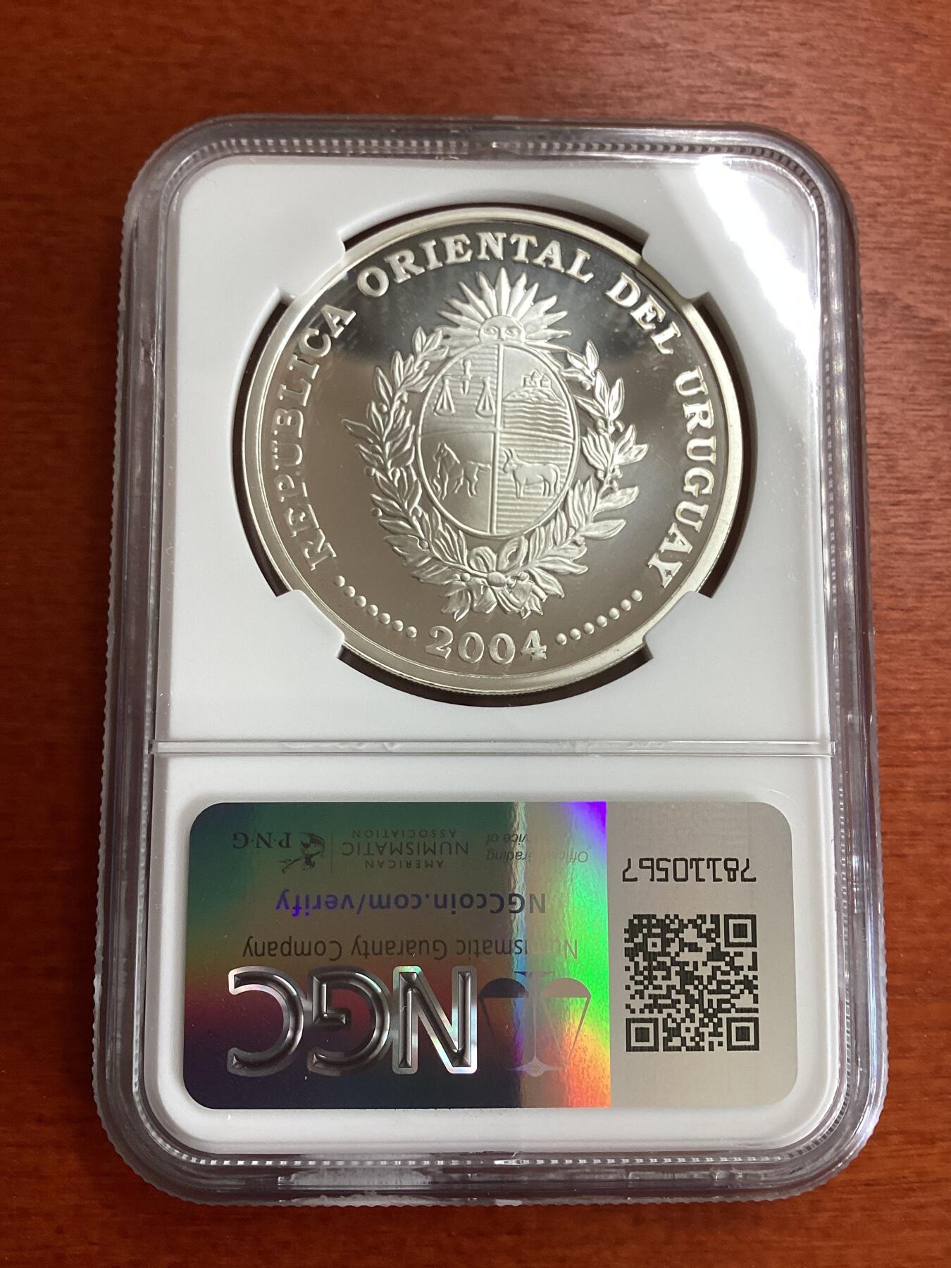 长老汇龙年精选第九场拍卖 2004乌拉圭2006德国世界杯三枚套币之二扑球1000比索精制银币，NGC PF68UC，唯一亚军分，更高分3枚