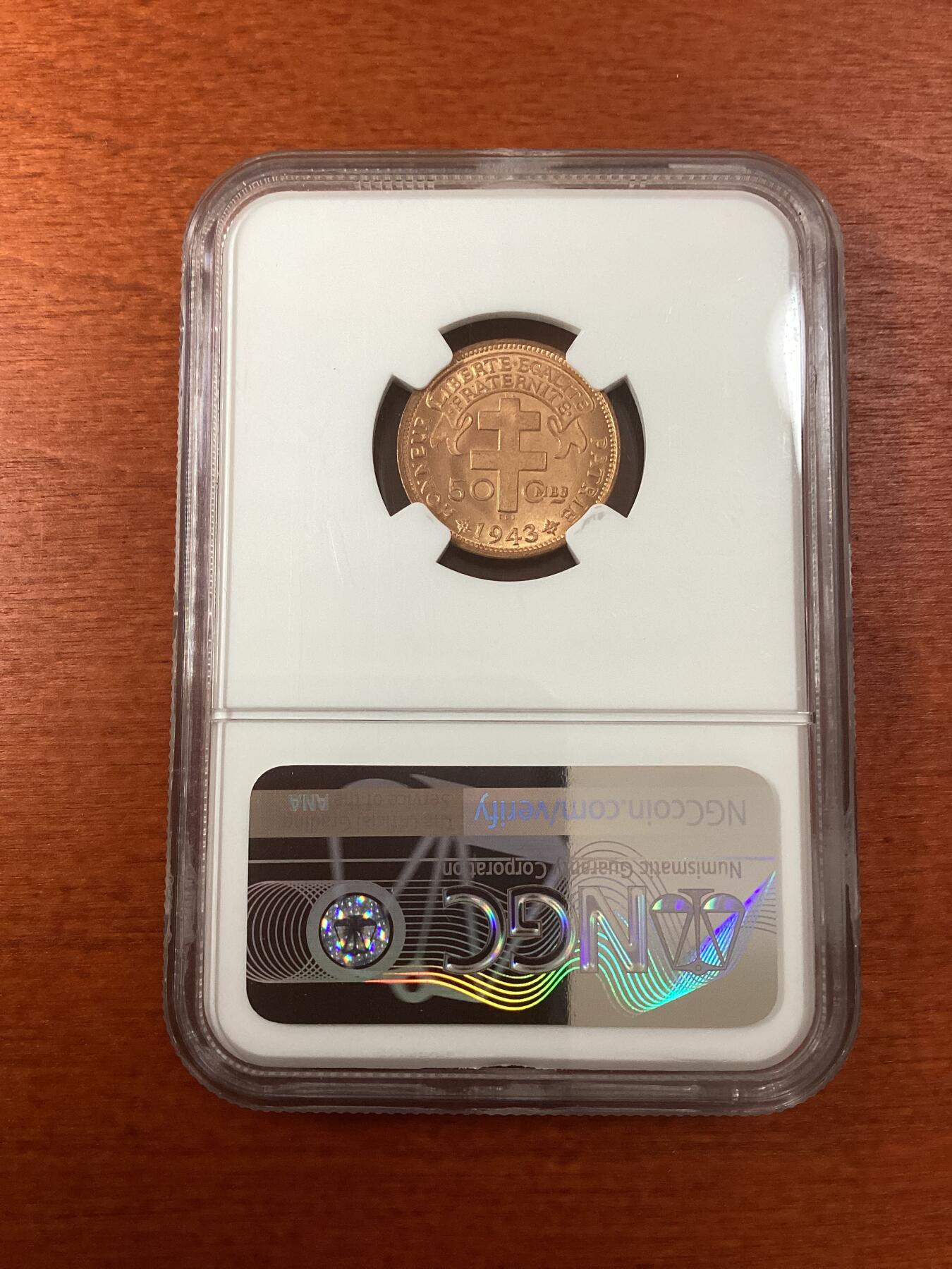 长老汇龙年精选第九场拍卖 1943SA 喀麦隆雄鸡50分铜币，NGC MS66RD，唯三冠军分，加字“自由”，非常漂亮！