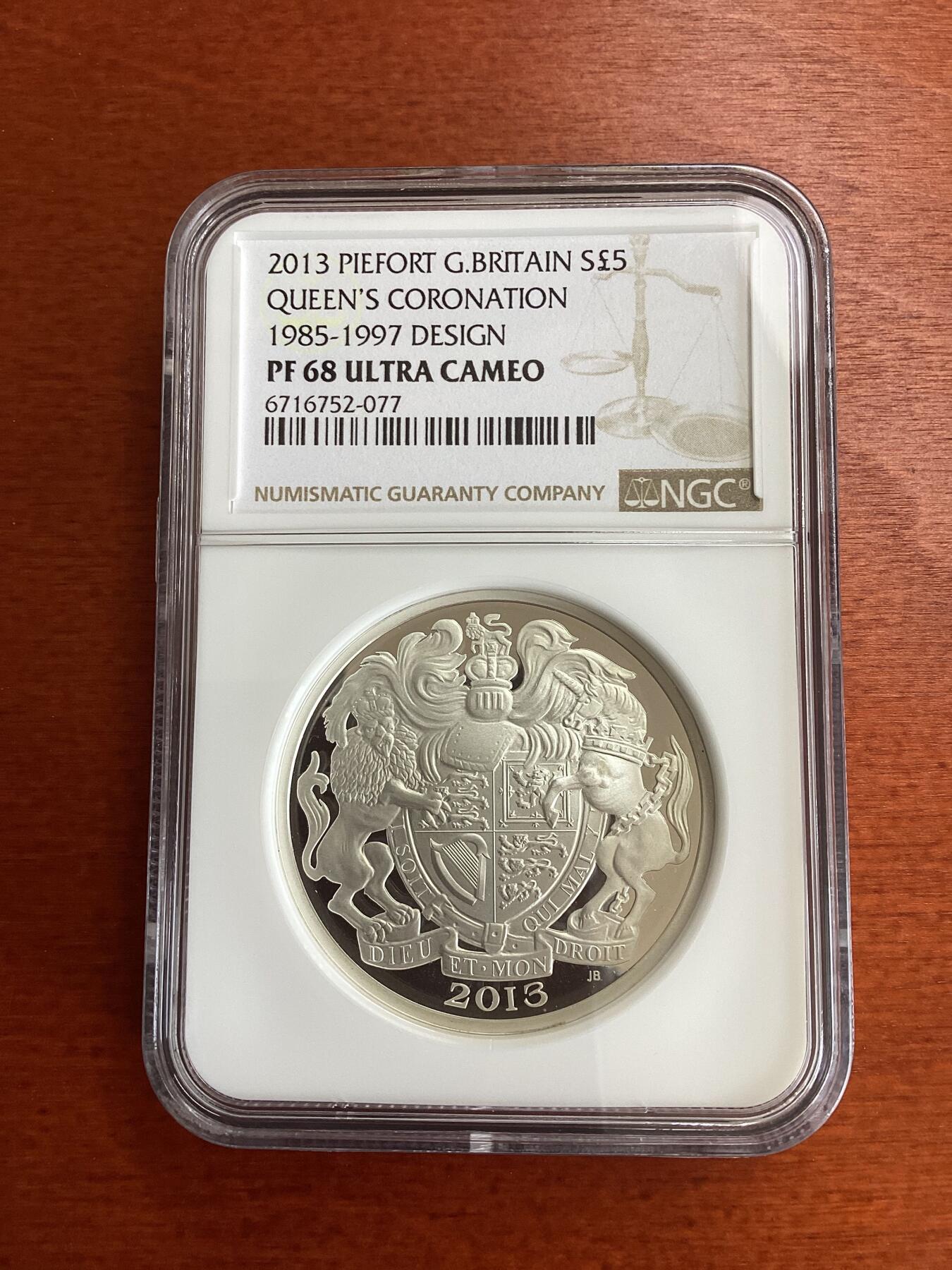 长老汇龙年精选第九场拍卖 英国伊丽莎白二世加冕六十周年纪念5英镑加厚精制银币， NGC PF68UC，加厚盒，85-97头像