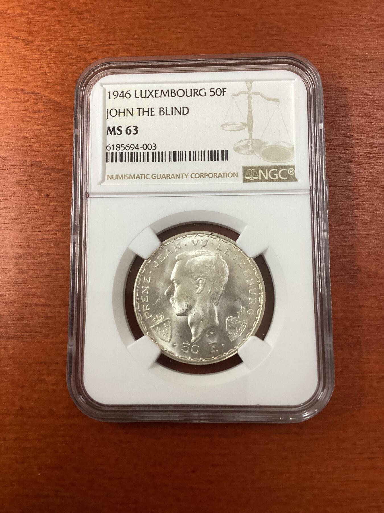 长老汇龙年精选第九场拍卖 1946 卢森堡盲人国王约翰战死沙场600周年50法郎银币，NGC MS63