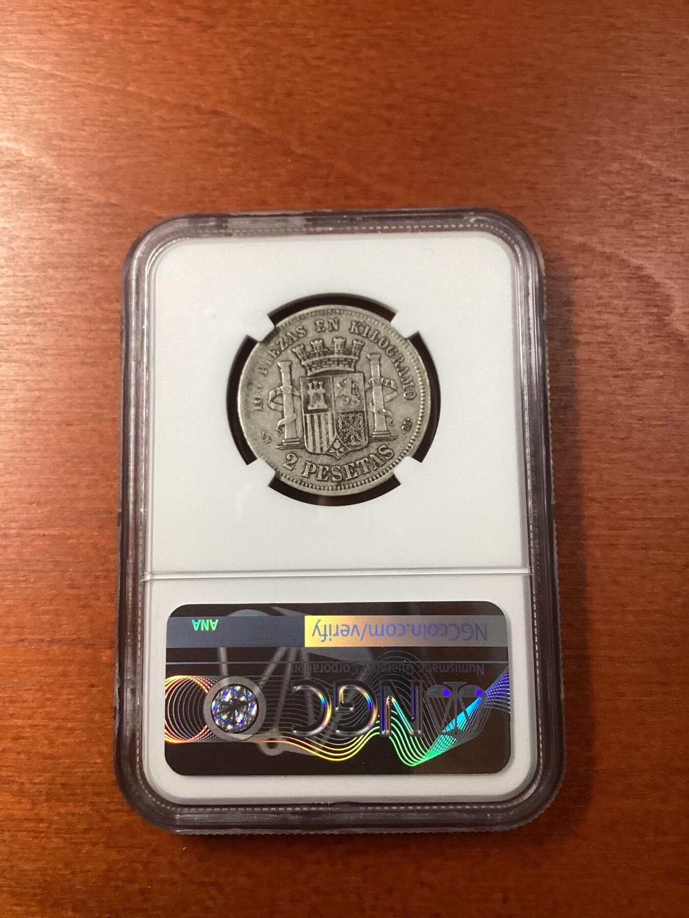 长老汇龙年精选第九场拍卖 1870(70) SNM 西班牙拿花2比塞塔银币，NGC XF45, 更高分仅有3枚, 官网标价XF275美金