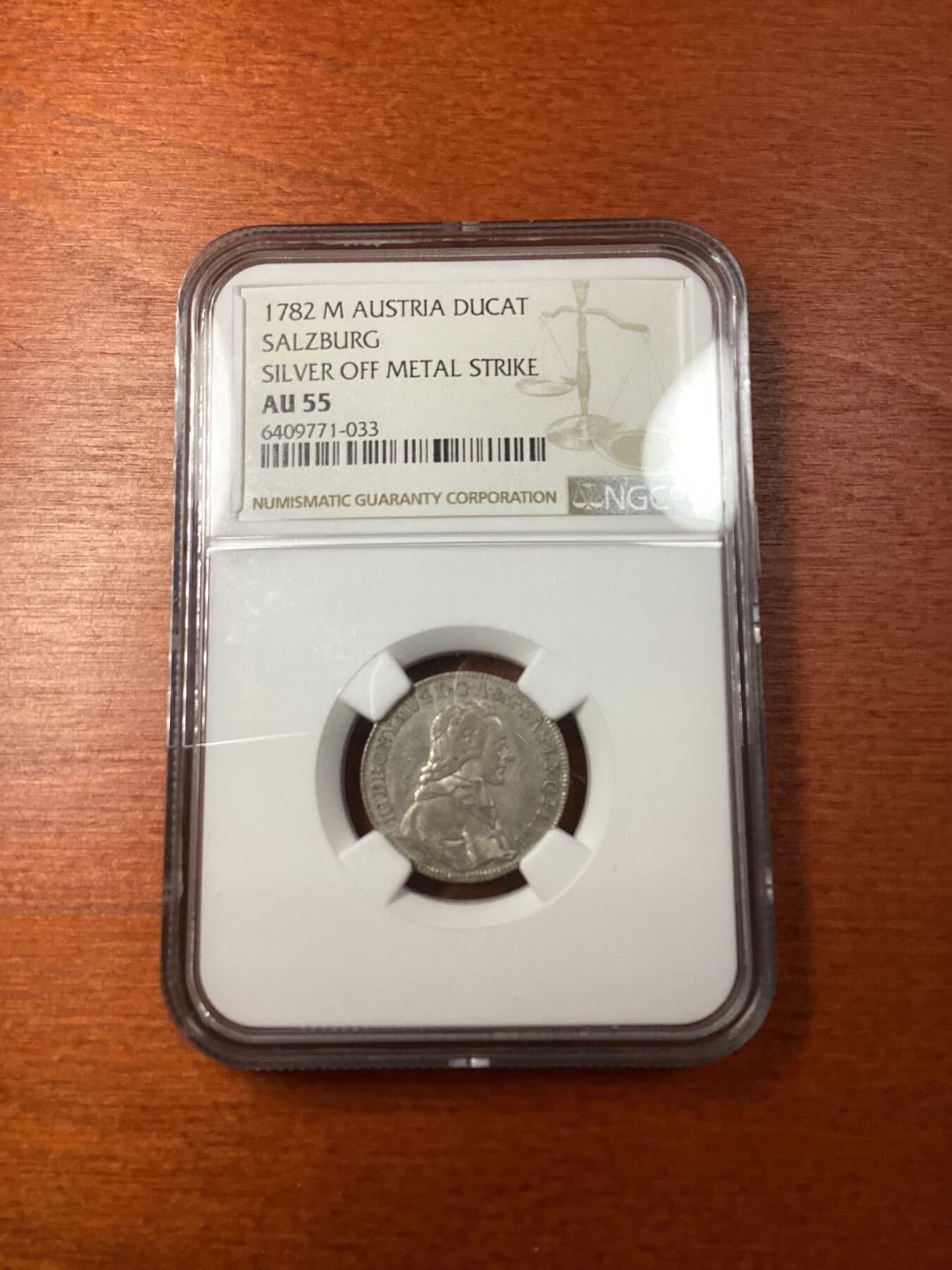 长老汇龙年精选第十场拍卖 1782 M 奥地利萨尔茨堡1杜卡特银币，NGC AU55，更高分8枚，“OFF METAL STRIKE”错版币的一种，底板用错，应该用黄金底板