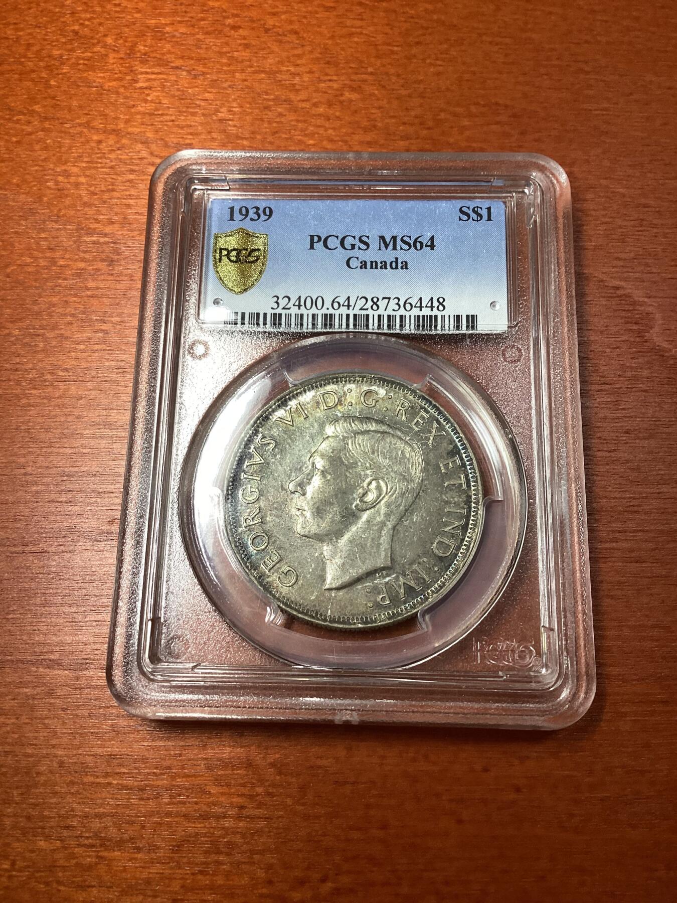 长老汇龙年精选第十场拍卖 1939加拿大乔治六世1加元银币，PCGS MS64分，五彩