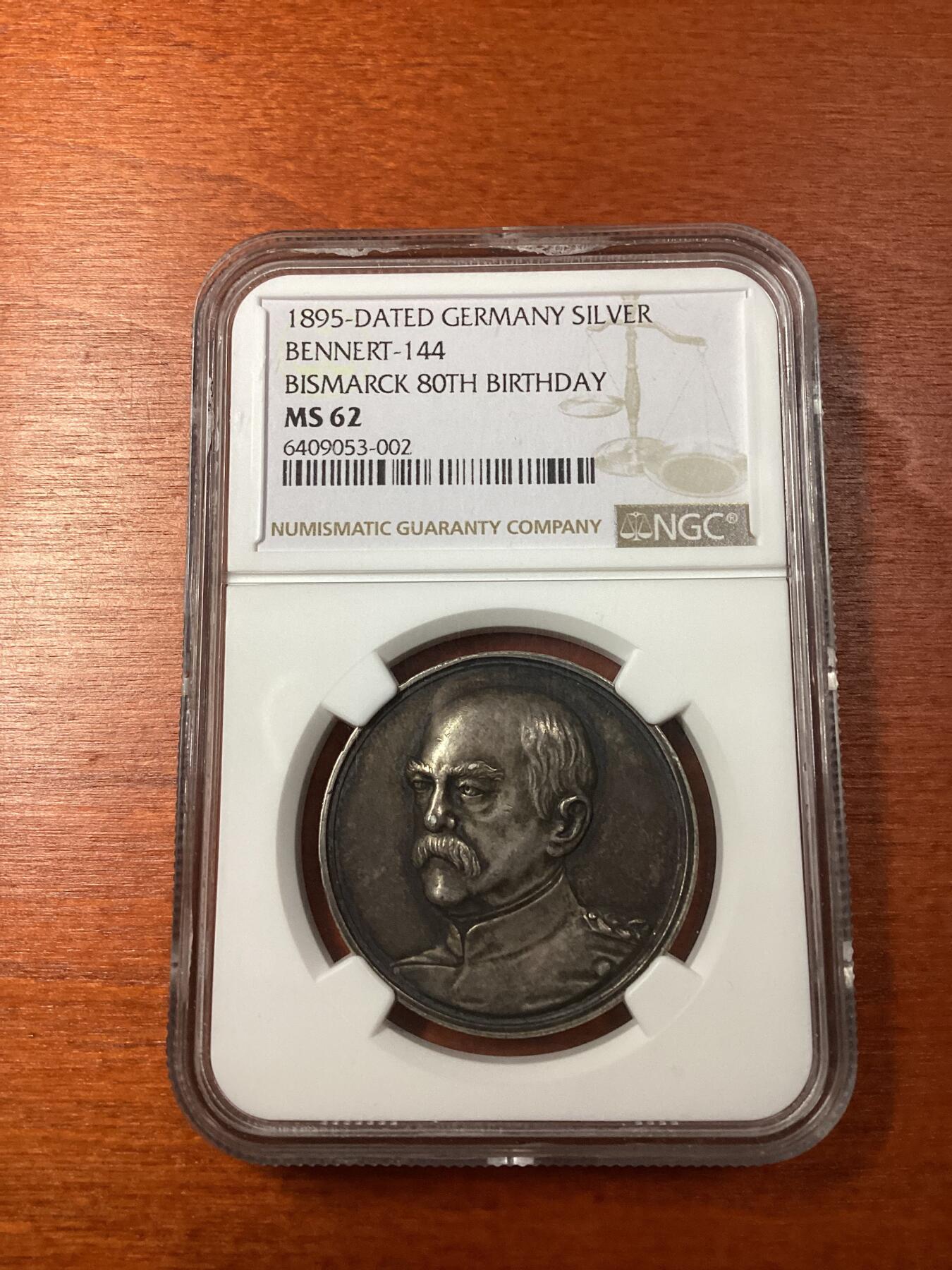长老汇龙年精选第十场拍卖 1895-DATED 德国铁血宰相俾斯麦80寿辰纪念银章，NGC MS62分，N盒唯一记录，背面设计别出心裁