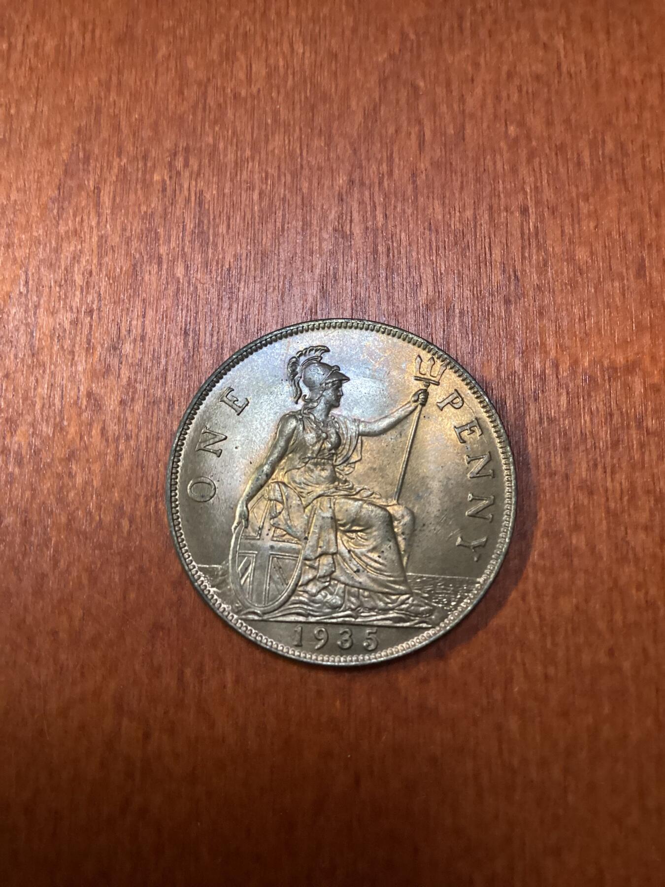 长老汇龙年精选第十场拍卖 1935英国乔治五世1便士铜币，原光，可评级，这枚普遍透打