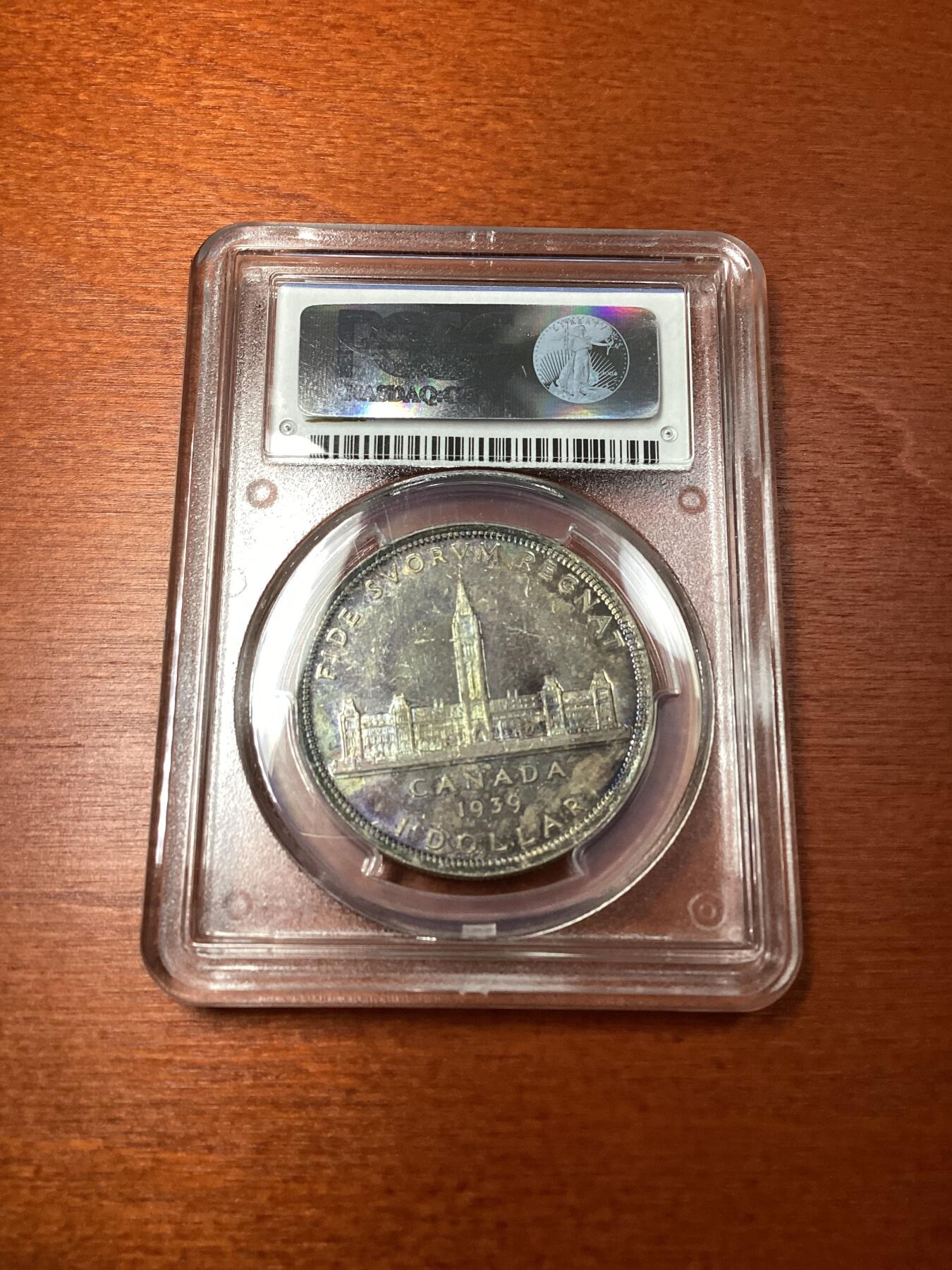 长老汇龙年精选第十场拍卖 1939加拿大乔治六世1加元银币，PCGS MS64分，五彩
