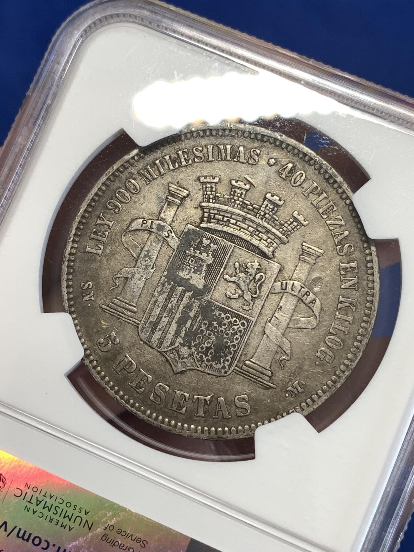 《竞宝斋》第289场- 周日，周一，周二 3场连拍 （全场包邮） NGC XFD 西班牙1870年坐人拿花5比塞塔双柱银币