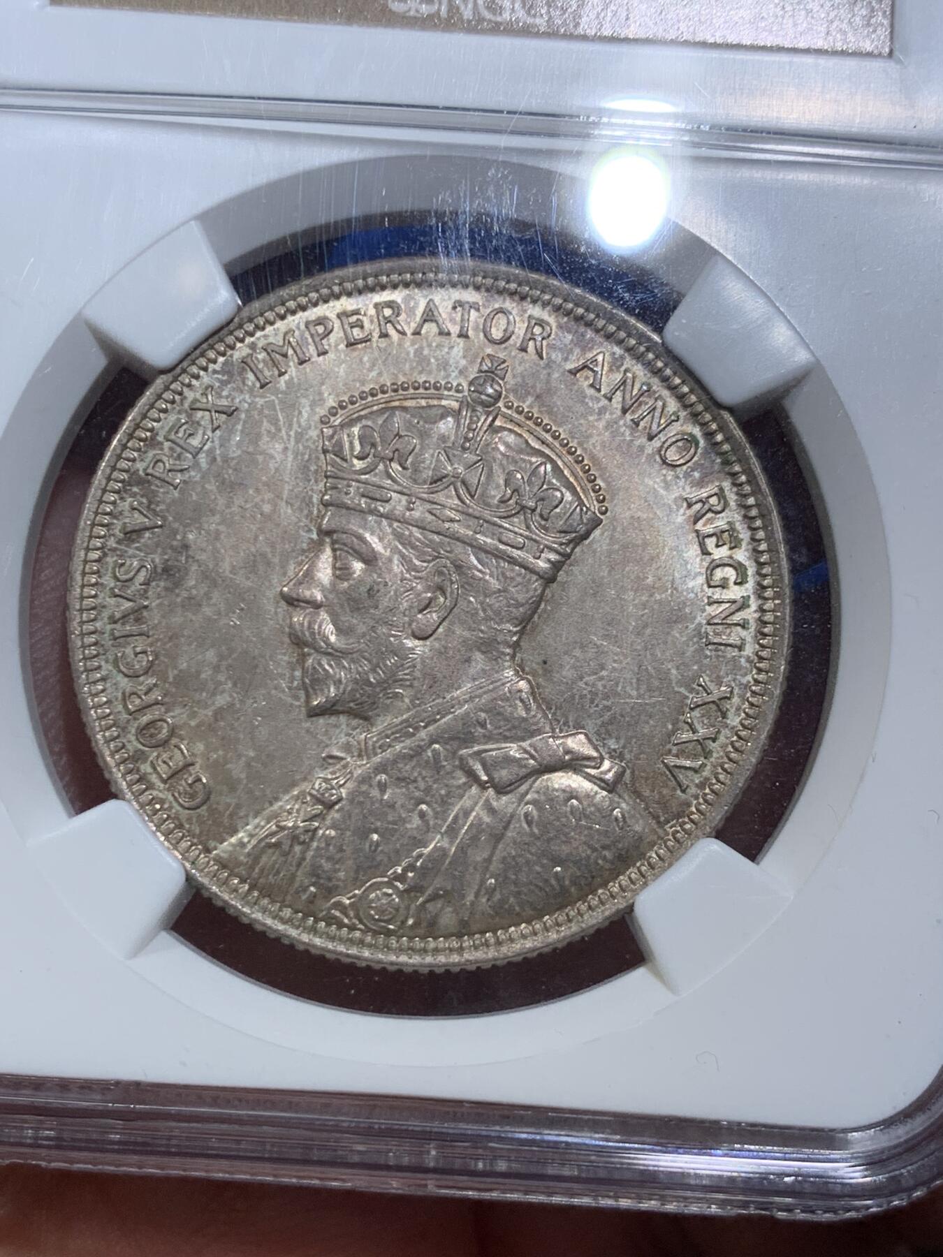 《竞宝斋》第289场- 周日，周一，周二 3场连拍 （全场包邮） NGC-MS64 英属加拿大1935年乔治五世1元划船大银币 包浆很漂亮 