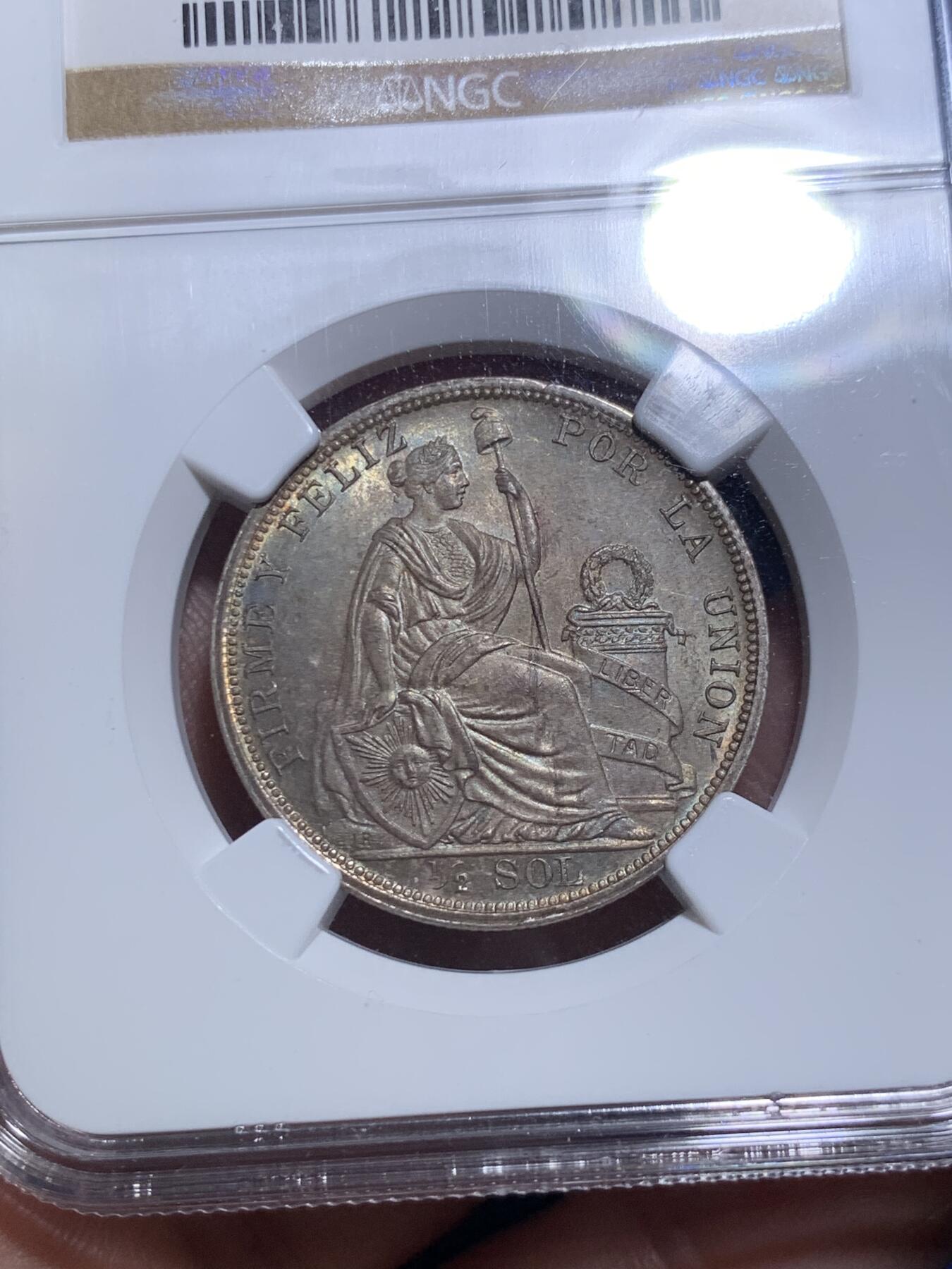 《竞宝斋》第289场- 周日，周一，周二 3场连拍 （全场包邮） NGC MS64 秘鲁1914年坐人女神半索尔银币 半圆大小，经典女神坐像。卷首币，正面浓郁深五彩，背面银光粉润，老N盒严评