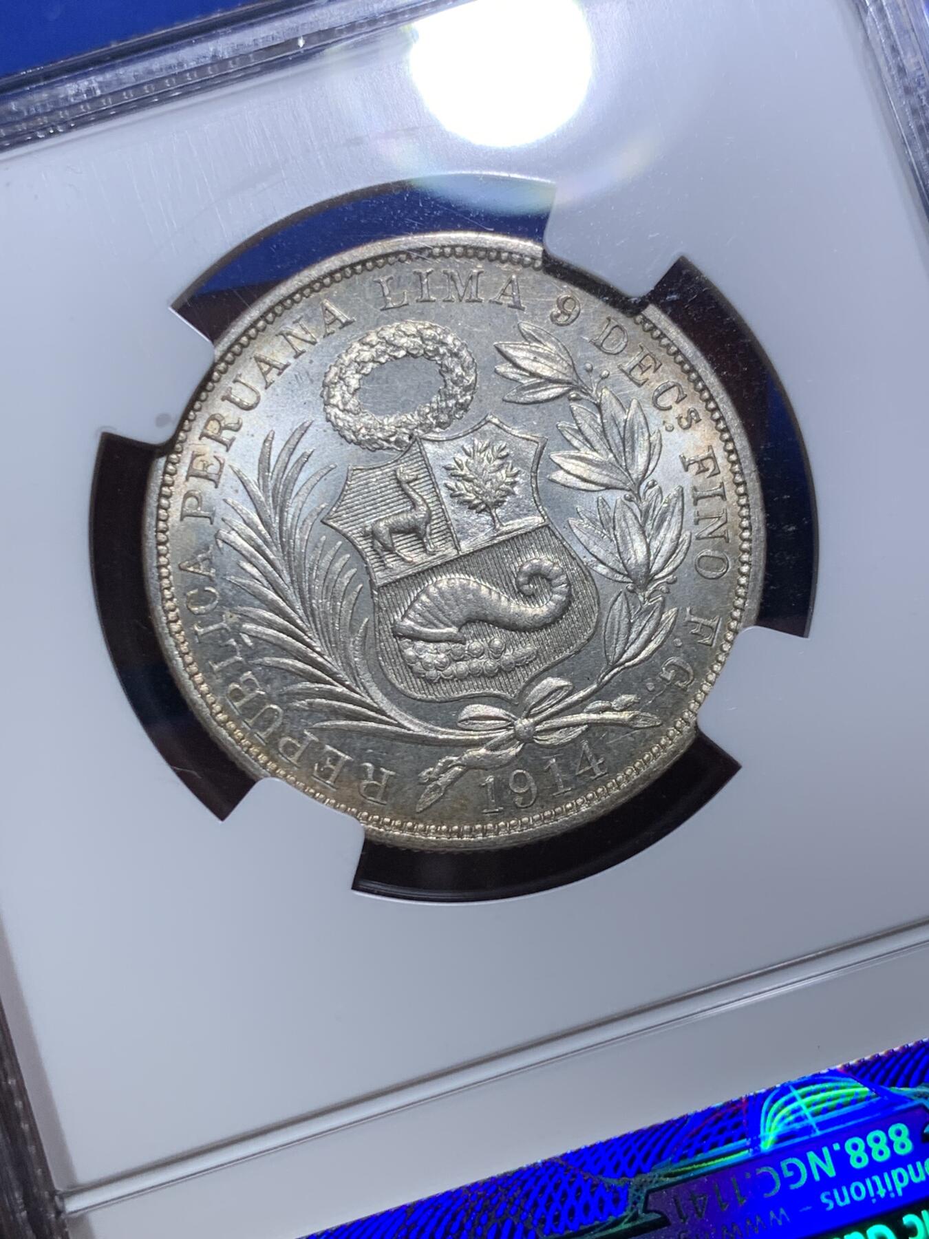 《竞宝斋》第289场- 周日，周一，周二 3场连拍 （全场包邮） NGC MS64 秘鲁1914年坐人女神半索尔银币 半圆大小，经典女神坐像。卷首币，正面浓郁深五彩，背面银光粉润，老N盒严评