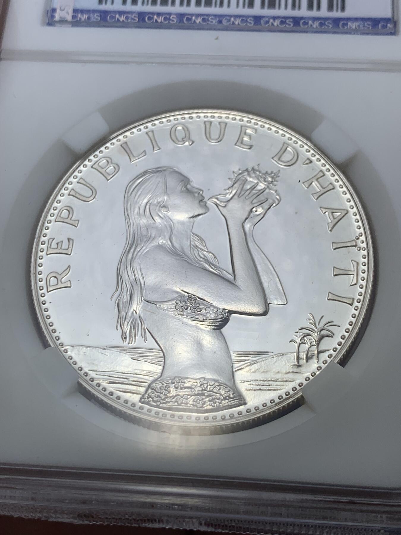 《竞宝斋》第289场- 周日，周一，周二 3场连拍 （全场包邮） CNCS PF68 海地1973年吹海螺的少女50古德精制银币 量少精稀 经典收藏品 20g 925银 38mm
